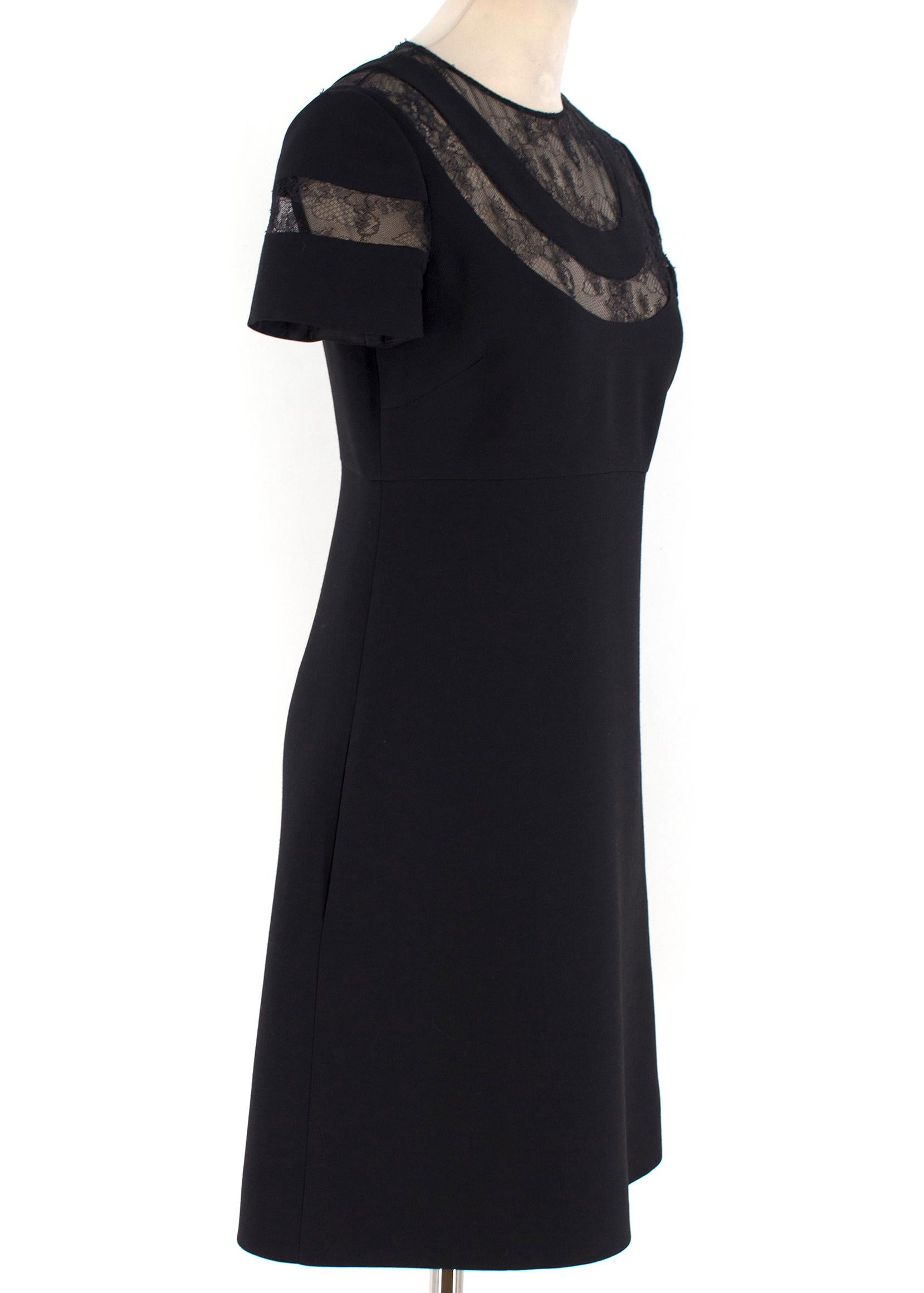 Valentino Black Lace-Insert Cady Dress

-Black short sleeve mini dress
-Sheer lave panelling at the shoulder, back and sleeves
-Back zip closure
-Tailored around the bust and waist
-Two front pockets
- Approx size UK12 / M / 44IT / 40FR

Please