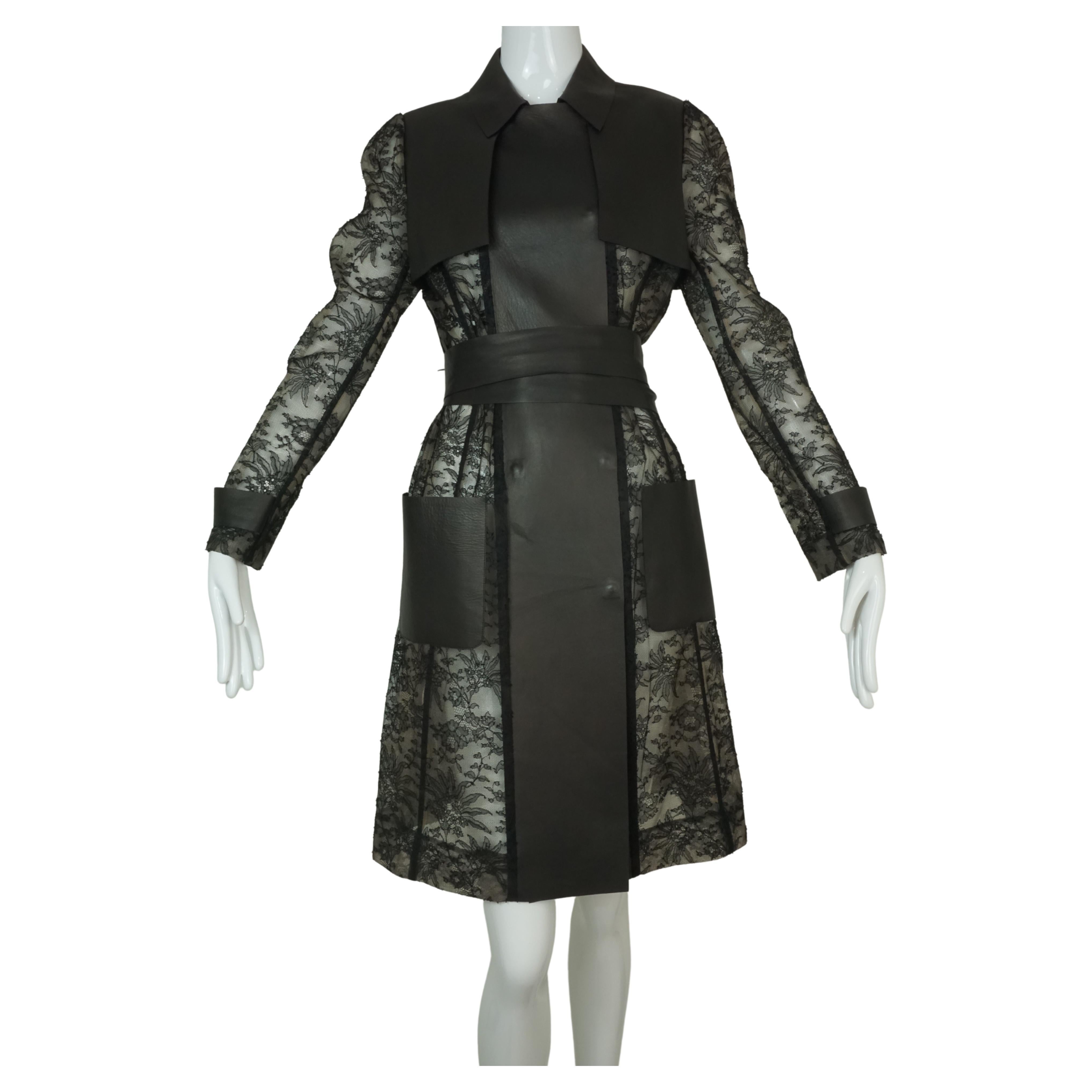 Valentino black lace and leather belted trench coat from 2011. Look 1 of the resort 2011 runway. US size 8. Made in Italy. Excellent Condition.


Foxy Couture is not an authorized reseller nor affiliated with any of the brands we