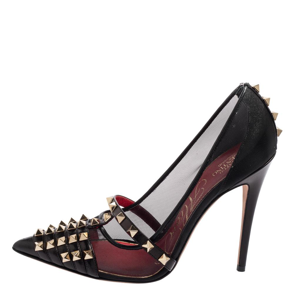 A beautifully constructed pair by Valentino to give you a luxurious feel. The pumps are fashioned in a pointed-toe style using leather and mesh. The 12 cm heels and Rockstud detailing amplify the pair's appeal.

Includes: Original Dustbag, Original