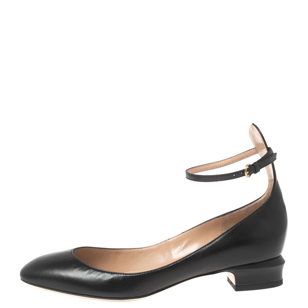 Crafted out of black leather, these pumps will add a luxe touch to your overall look. They feature covered toes, slight heels, and buckle ankle straps. This stylish pair from Valentino will make a great addition to your collection.

Includes: