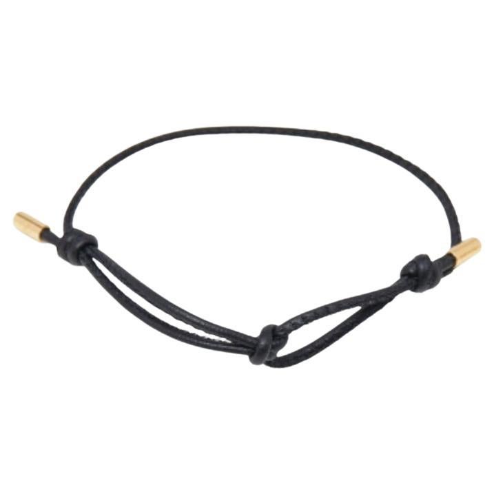 Pulsera ajustable de cordón de cuero negro Valentino en venta
