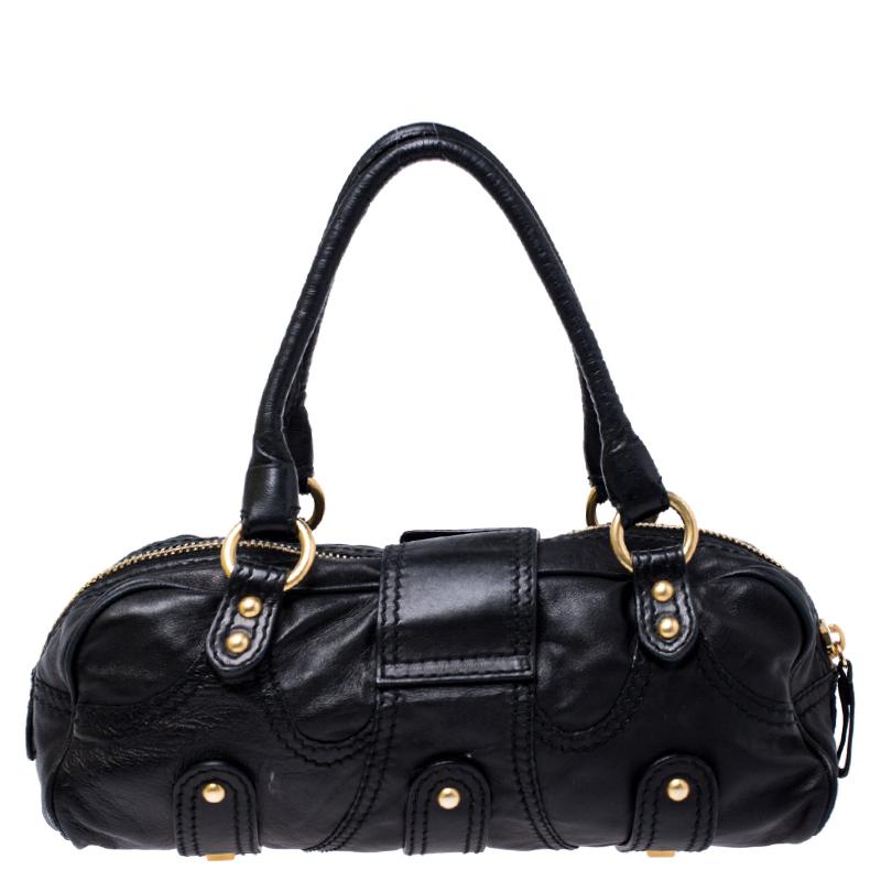 This Crystal Catch satchel from Valentino is a worthy buy. It has been crafted from black leather and accented with gold-tone hardware. It has dual handles and the insides are perfectly sized to carry your necessities.

Includes: The Luxury Closet