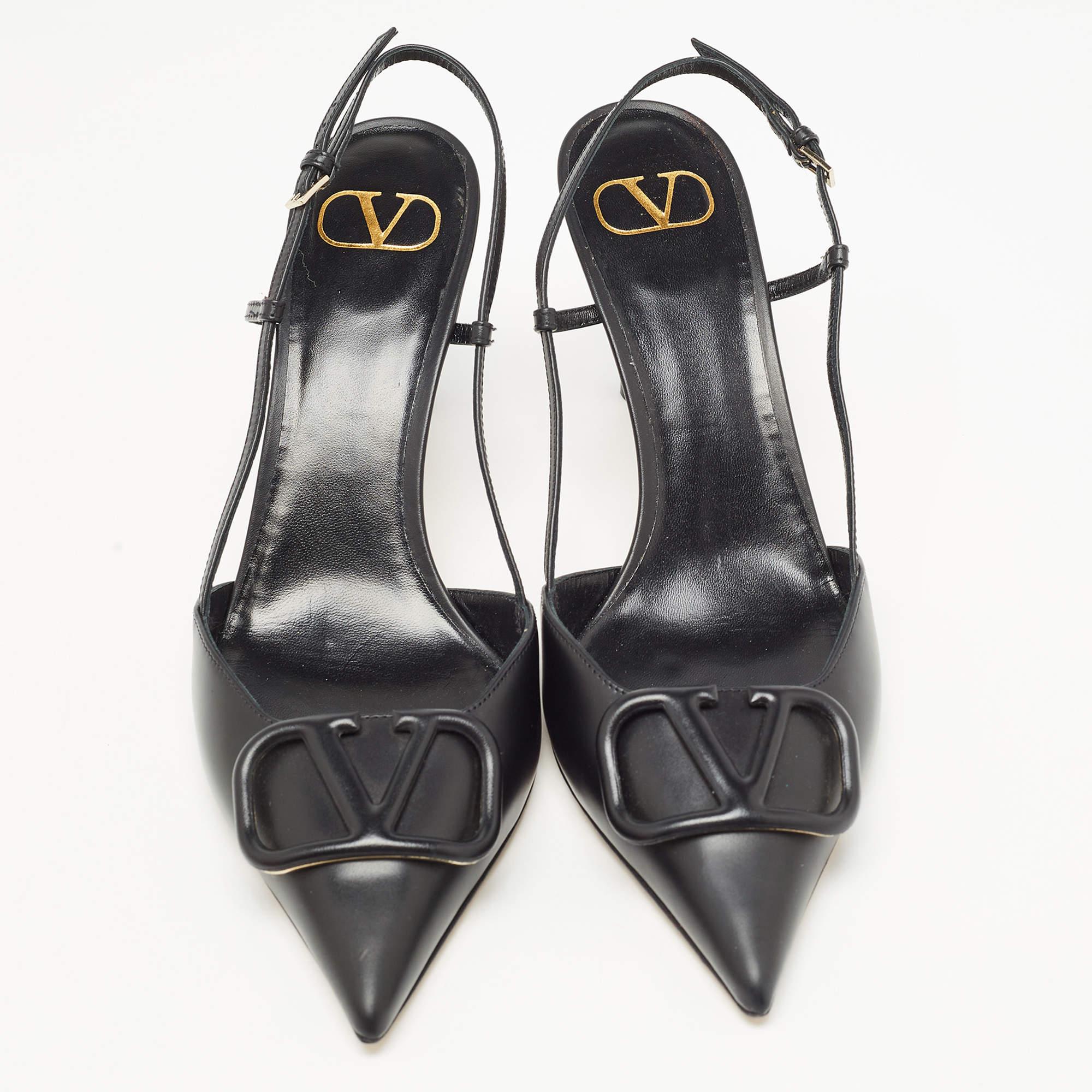 Valentino's pumps exude sophistication and modern elegance. Crafted from luxurious black leather, they feature a sleek pointed toe, a distinctive VLogo accent, and a comfortable slingback strap. These pumps seamlessly blend timeless style with