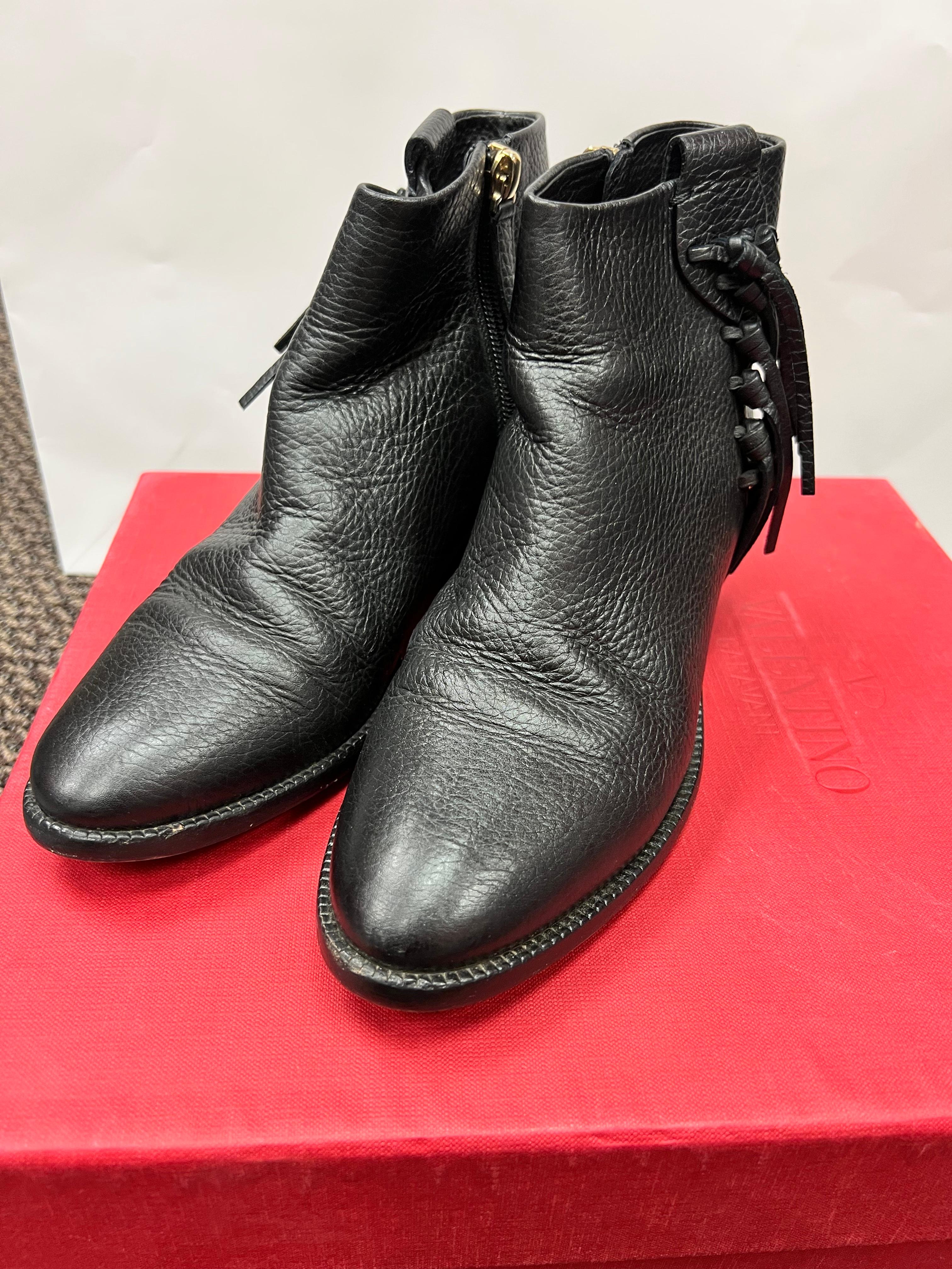 Valentino Black, Leather Fringe Boots. Ankle height with zipper. 
Size 36 in pristine condition (see soles)
Leather slightly relaxed. 
Estimated retail $1265
