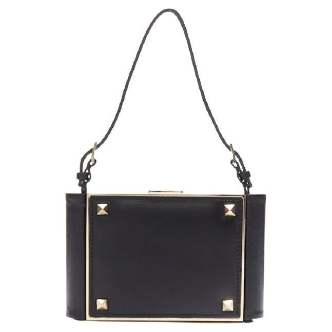 VALENTINO black leather gold Rockstud metal frame minaudiere clasp clutch bag For Sale