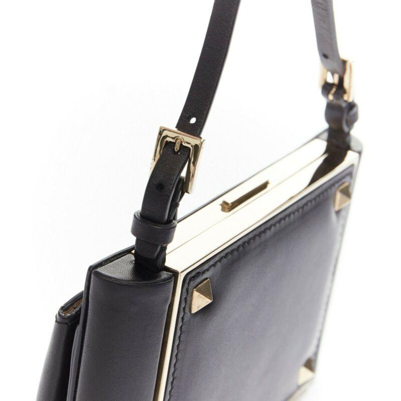 VALENTINO black leather gold rockstud metal frame miniaudiere clasp clutch bag For Sale 3