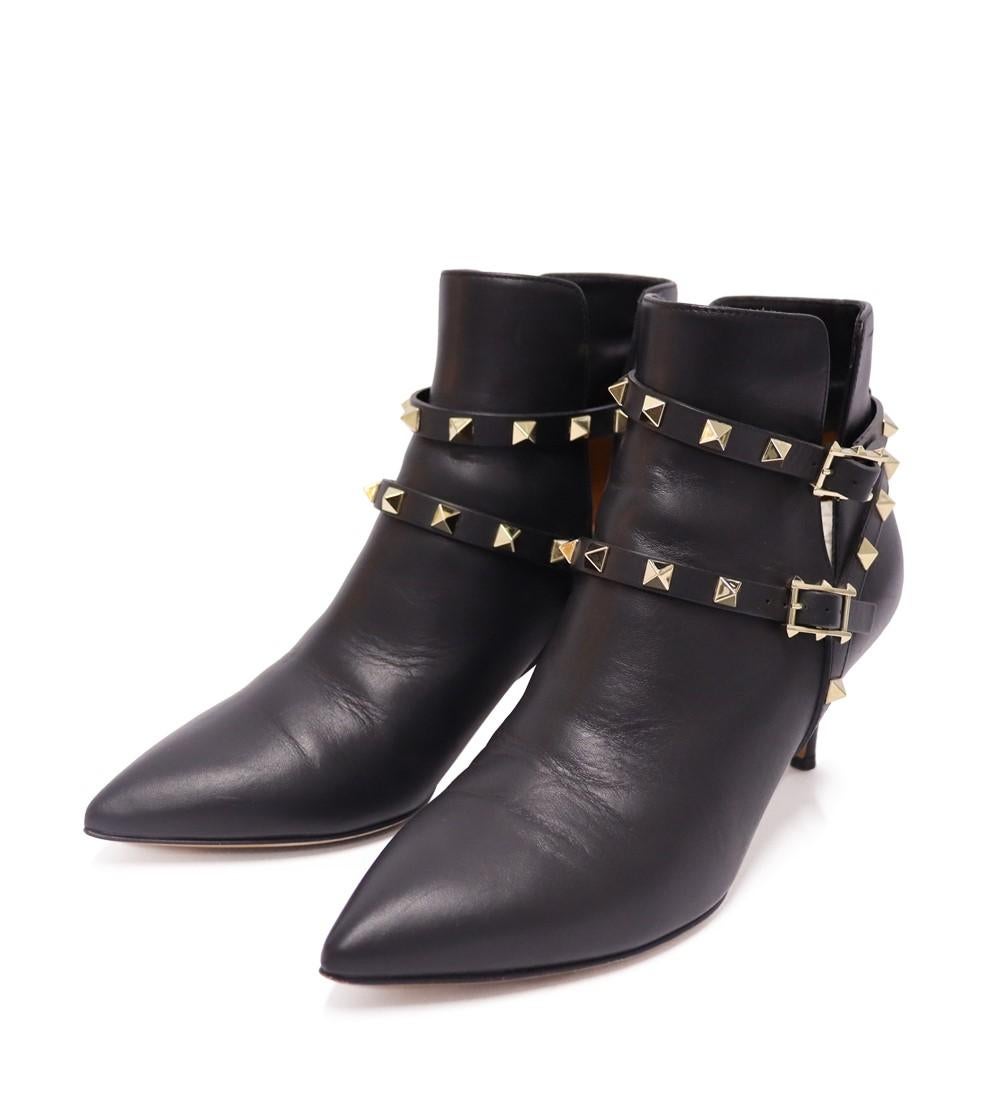 Valentino Black Leather Rockstud  Ankle Boots, Features Pointed Toe , leather-lined interior, , stiletto heels and signature Valentino's studs.

Material: Leather
Size: EU 38 
Heel Height: 7cm
Overall Condition: Good
Interior Condition: Signs of