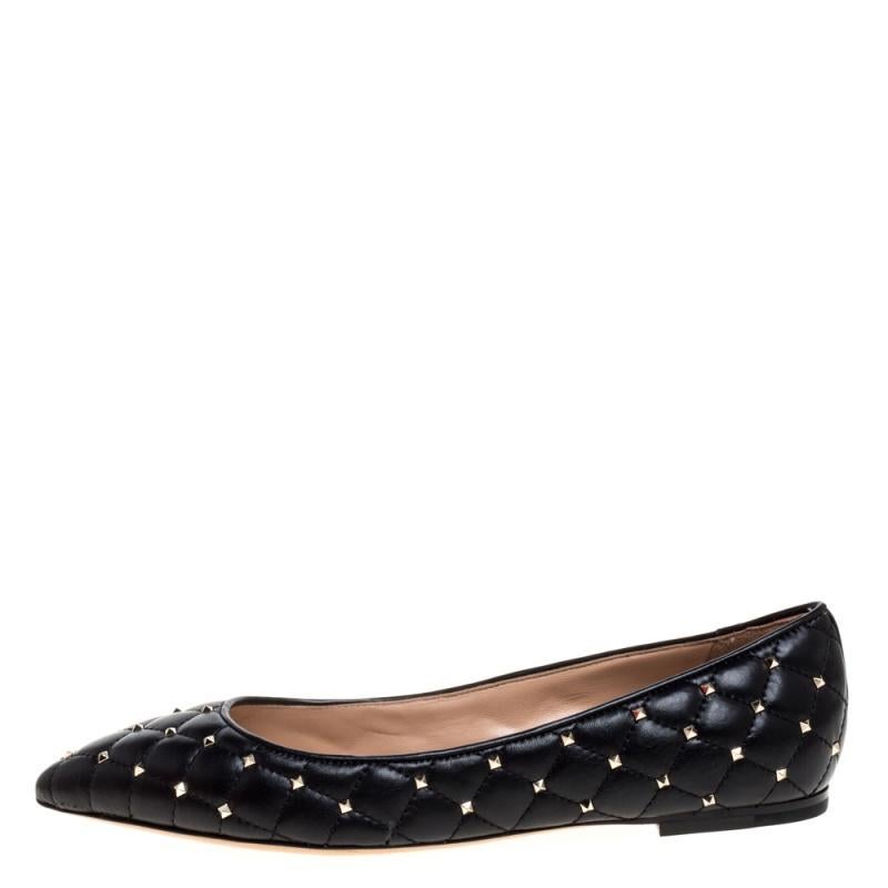 These Valentino ballet flats are sure to lend you an elegant and stylish look. These point-toe flats have been made in Italy from black leather and embellished with gleaming Rockstuds - each meticulously applied to accentuate the quilted pattern.