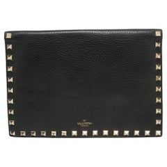Pochette organizer Rockstud in pelle nera di Valentino