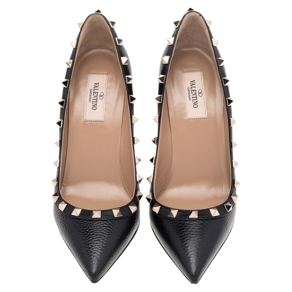 Instantly recognizable, the Rockstud pumps from Valentino are one of the most iconic styles from the brand. These pumps have been crafted from black leather and adorned with the signature Rockstud accents. They are complete with pointed toes,