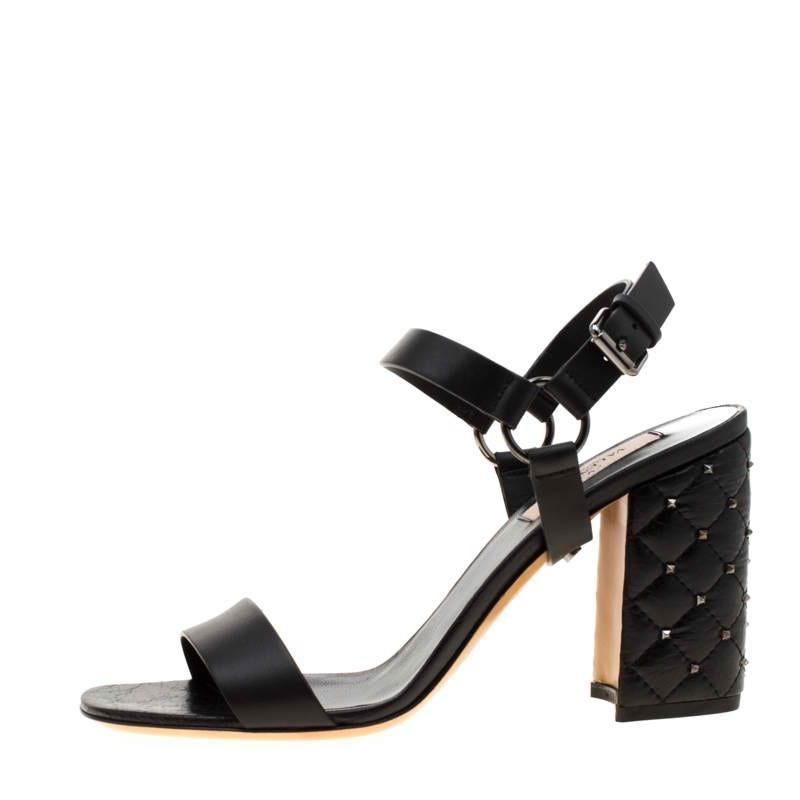 Simplicity is the ultimate sophistication, and these black block heel sandals remind you of exactly that. It is crafted impeccably from the finest leather and has an amazing rockstud design that sets it apart. They come with ankle straps. These