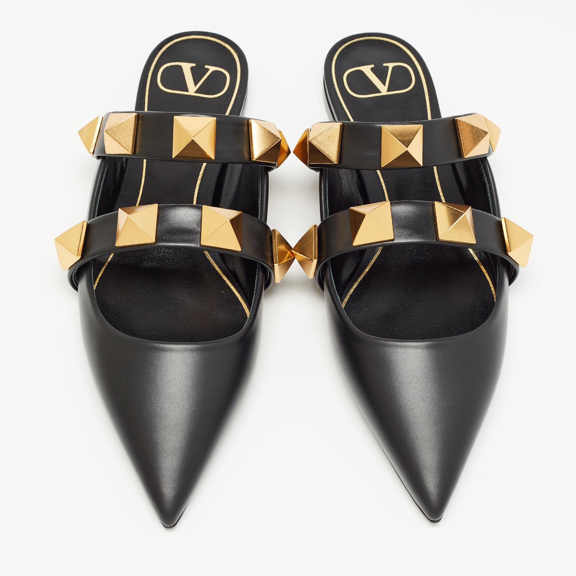 Valentino shoes are known for their unique designs that emanate the label's feminine verve and immaculate craftsmanship that makes their creations last season after season. Crafted from leather in a versatile black shade, the straps are adorned with