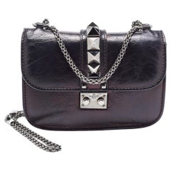 Valentino - Petit sac à rabat en cuir noir Rockstud Glam Lock