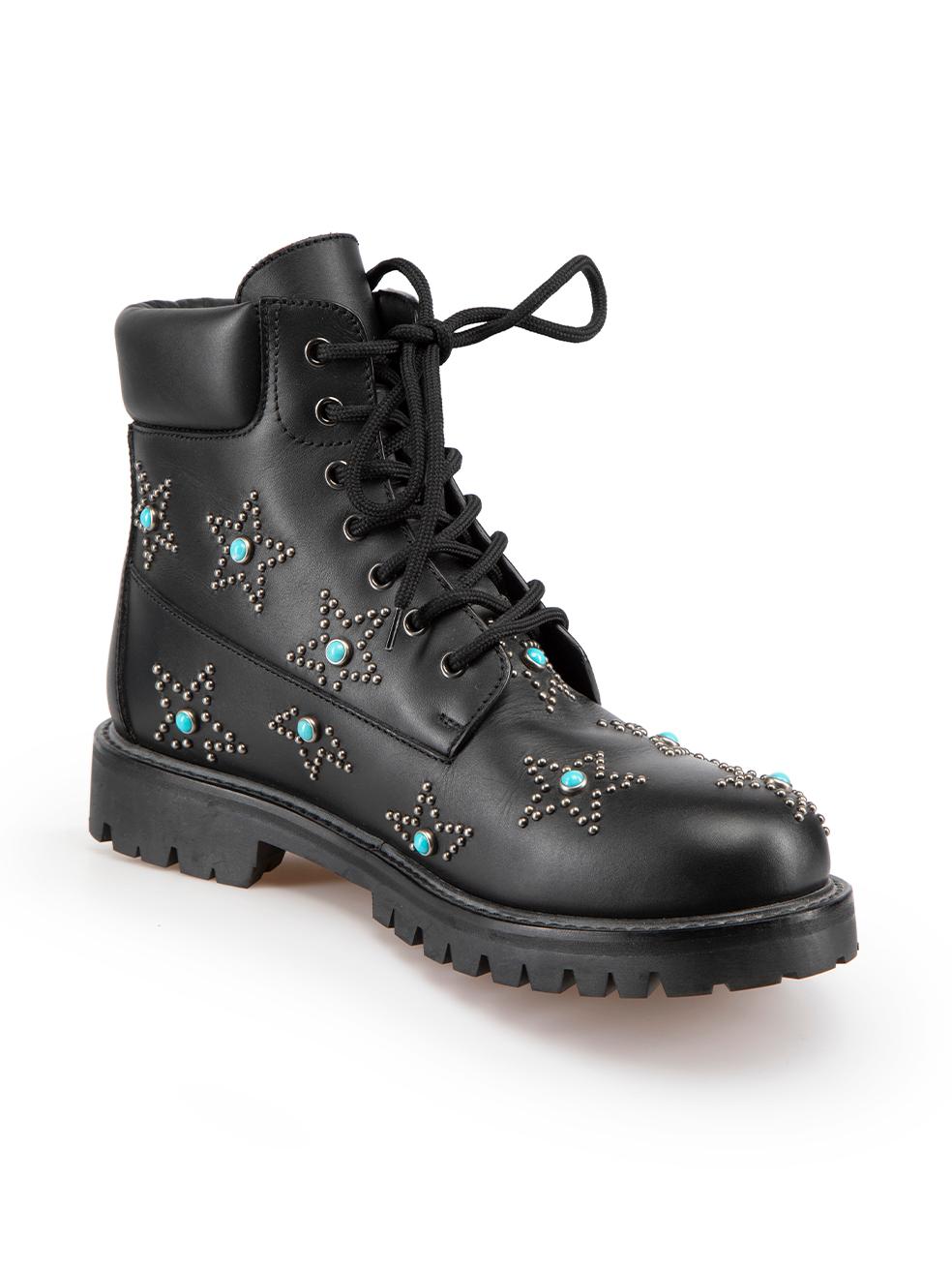 CONDITION is Very good. Minimal wear to boots is evident. Minimal wear to the embellishments at the heel of the right boot with scratches to two of the turquoise stones on this used Valentino designer resale item.

Details
Black
Leather
Combat