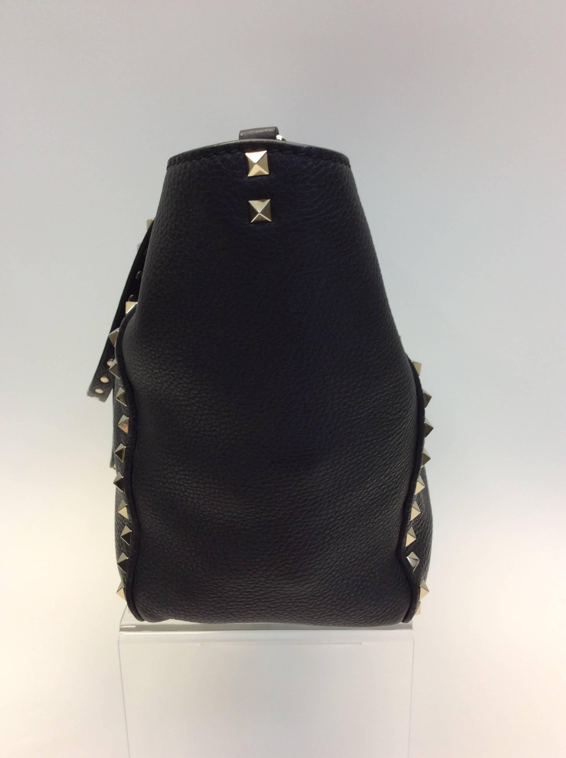 Valentino Black Studded Shoulder Bag
Silver Hardware
$2250
Made in Italy
Leather
14