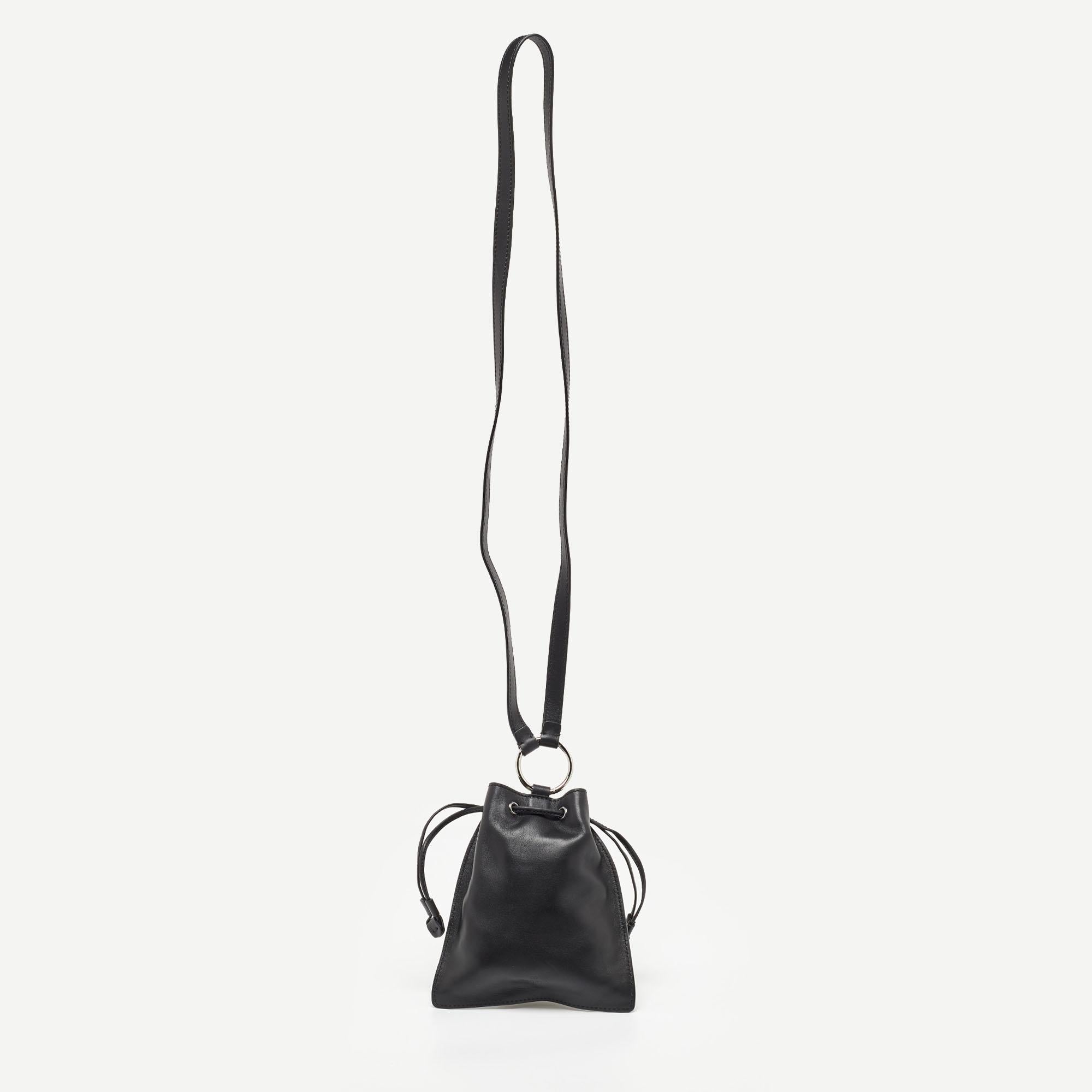 This Valentino pouch is such a stylish fashion-meets-function accessory you'll love carrying it all the time. Crafted from quality materials, it can easily fit your essentials.

