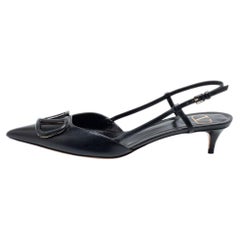 Valentino Schwarze Leder-Pumps mit VLogo und Slingback Größe 38,5