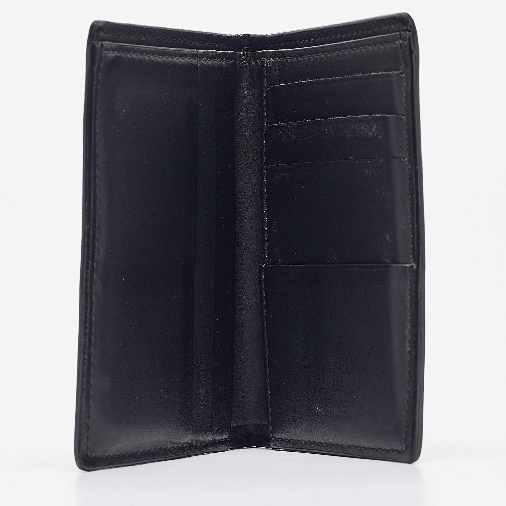 This stylish and functional cardholder is a must have in your collection. It is equipped with multiple well lined slots to hold your cards.