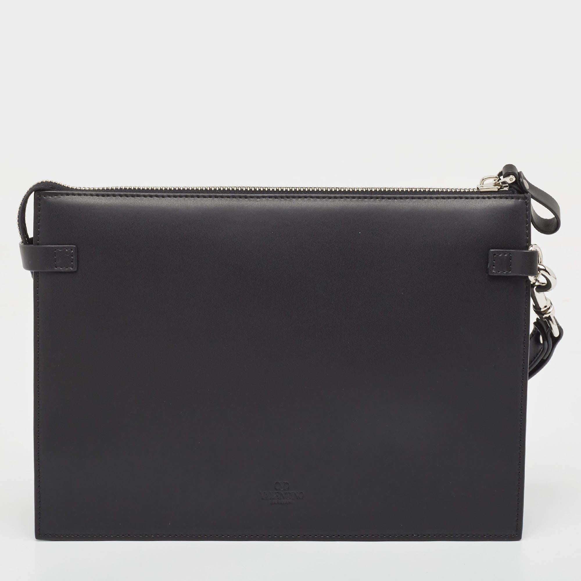 This Valentino clutch is just the right accessory to compliment your stylish ensemble. It comes crafted in quality material featuring a well-sized interior that can comfortably hold all your little essentials.

Includes: Original Dustbag, Original