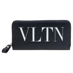 Valentino - Portefeuille en cuir noir avec fermeture éclair VLTN