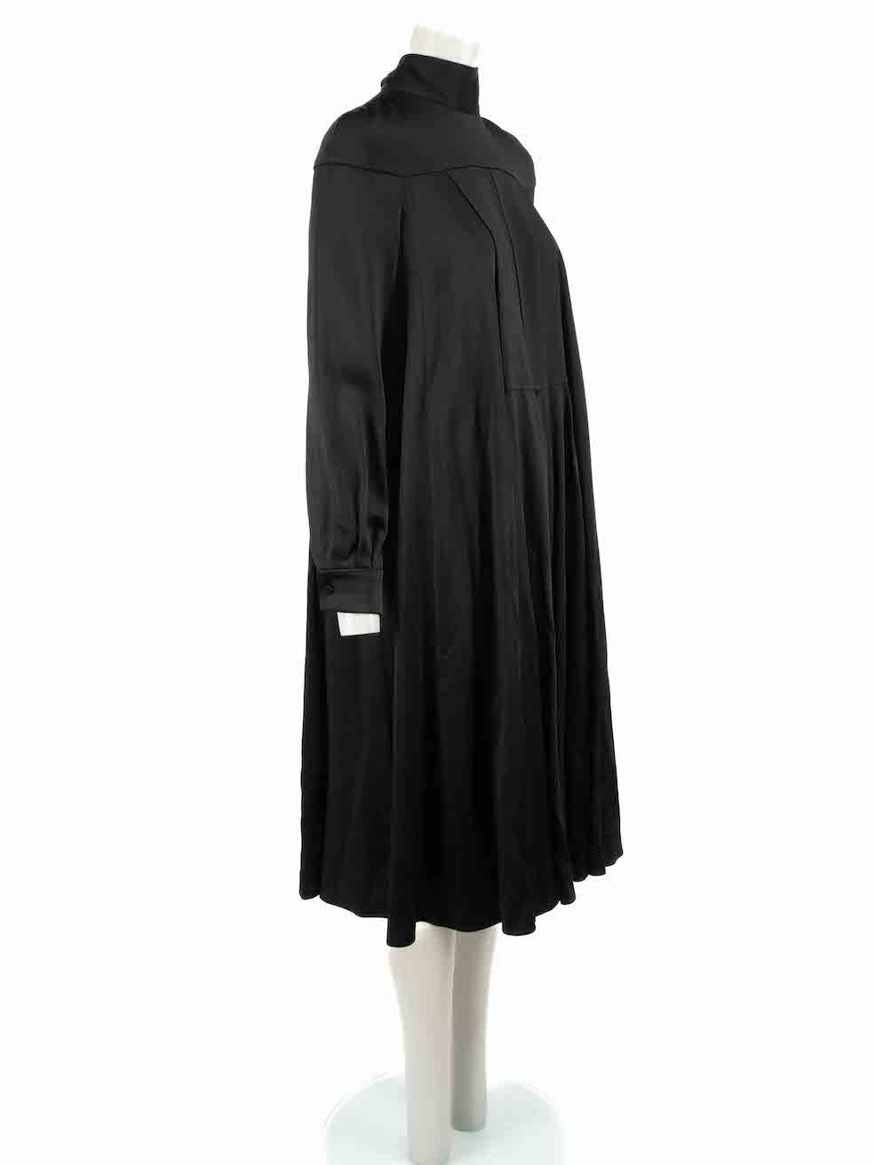 CONDITION is Very good. Hardly any visible wear to dress is evident on this used Valentino designer resale item.
 
 Details:
 Black
 Viscose
 Dress
 Long sleeves
 Maxi
 Neck tie detais 
Front pleat detail 
Back zip and hook fastening 
Made in