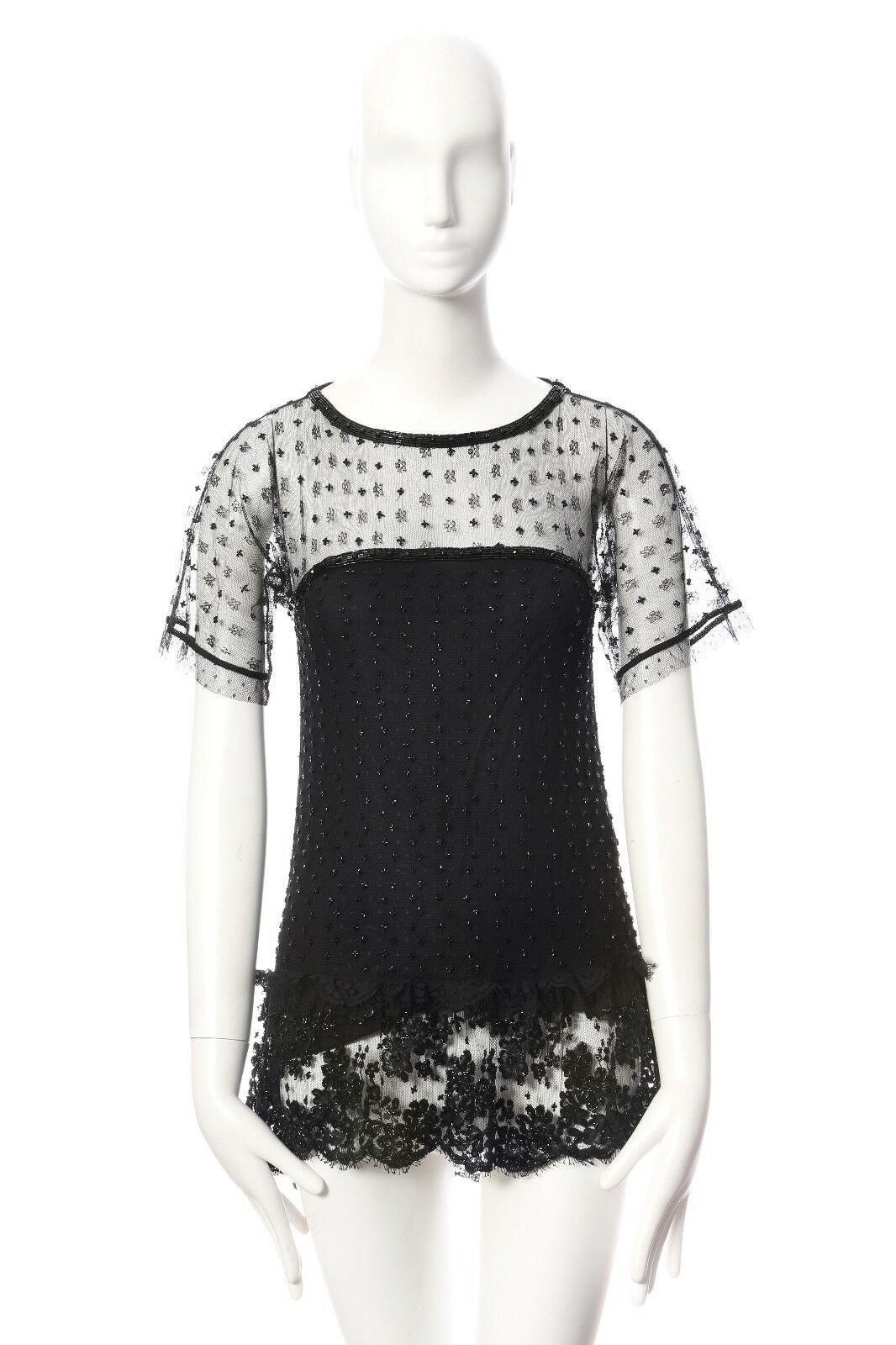 VALENTINO black mesh lace bead embellished t-shirt couture top IT40 US4 UK8 S 
Reference: CAWG/A00099 
Brand: Valentino 
Material: Viscose 
Color: Black 
Pattern: Other 
Extra Detail: Viscose, polyamide, nylon. Sheer mesh lace outer. Beaded rounded