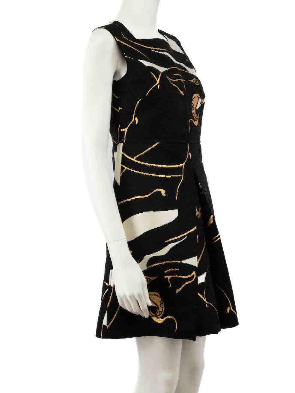CONDITION is Very good. Minimal wear to dress is evident. Minimal wear to the front with pulls to the weave on this used Valentino designer resale item.
 
 Details
 Black
 Polyester
 Dress
 Jacquard panther pattern
 Gold metallic detail
 Sleeveless
