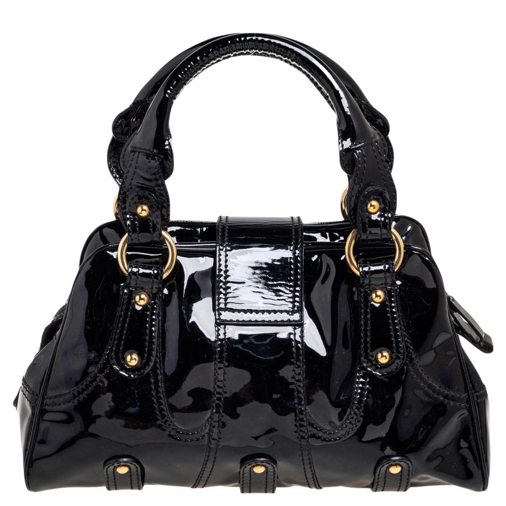 Now here's a satchel that is both stylish and functional! The House of Valentino brings us this gorgeous Catch satchel that will make you look glamorous! It is made from black patent leather, with a crystal-studded logo embellishment on the front.