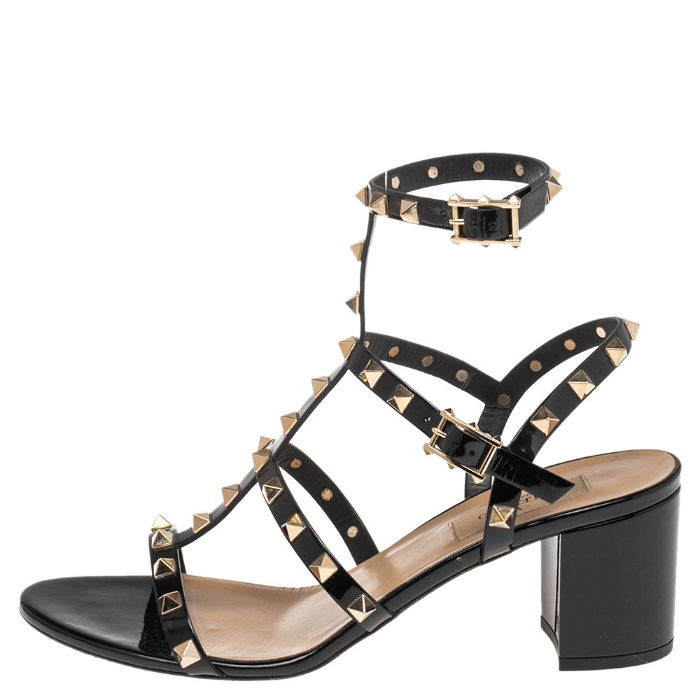 When considering Valentino, three words come to mind: luxurious, bold, and iconic. These gorgeous sandals are crafted from patent leather, and the sleek silhouette is adorned with the carefully placed Rockstuds. They are complete with open toes and