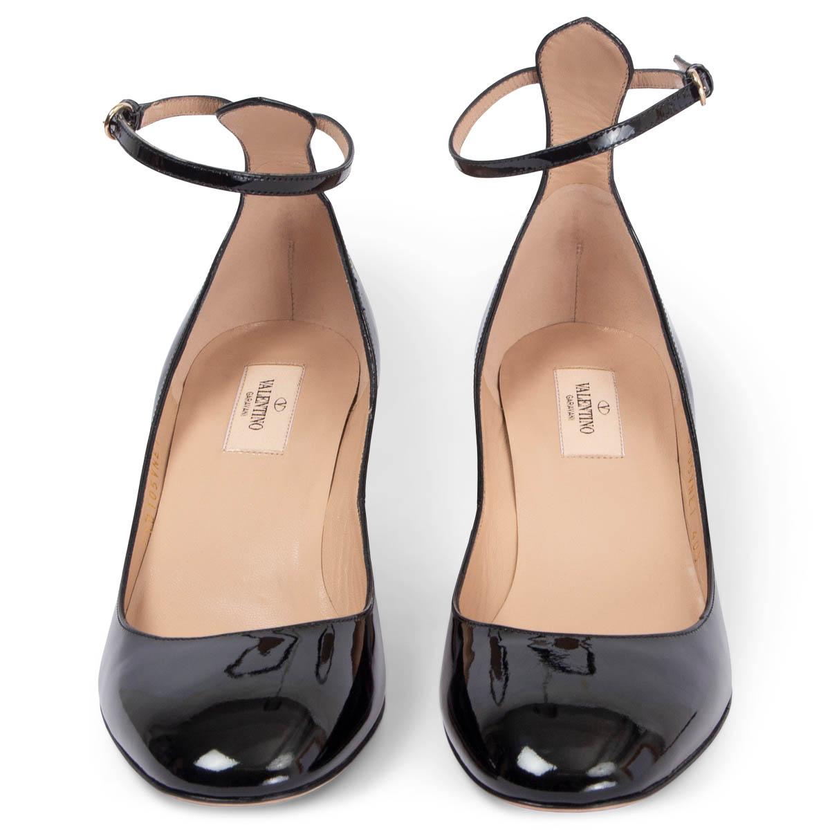 100% authentic Valentino Tan-Go ankle-strap block-heel pumps in black patent leather with patent leather-covered block heel. Have been worn once inside and are in virtually new condition. 

Measurements
Imprinted Size	40.5
Shoe Size	40.5
Inside