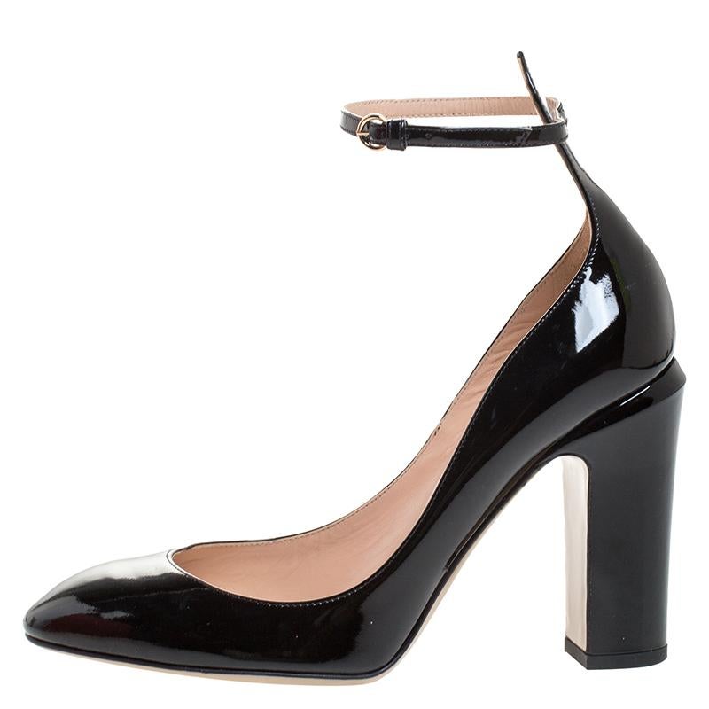 Crafted out of black patent leather, these pumps will add a luxe touch to your overall look. They feature covered toes, 10.5 cm heels and buckle ankle straps. This stylish pair from Valentino will make a great addition to your collection.

Includes: