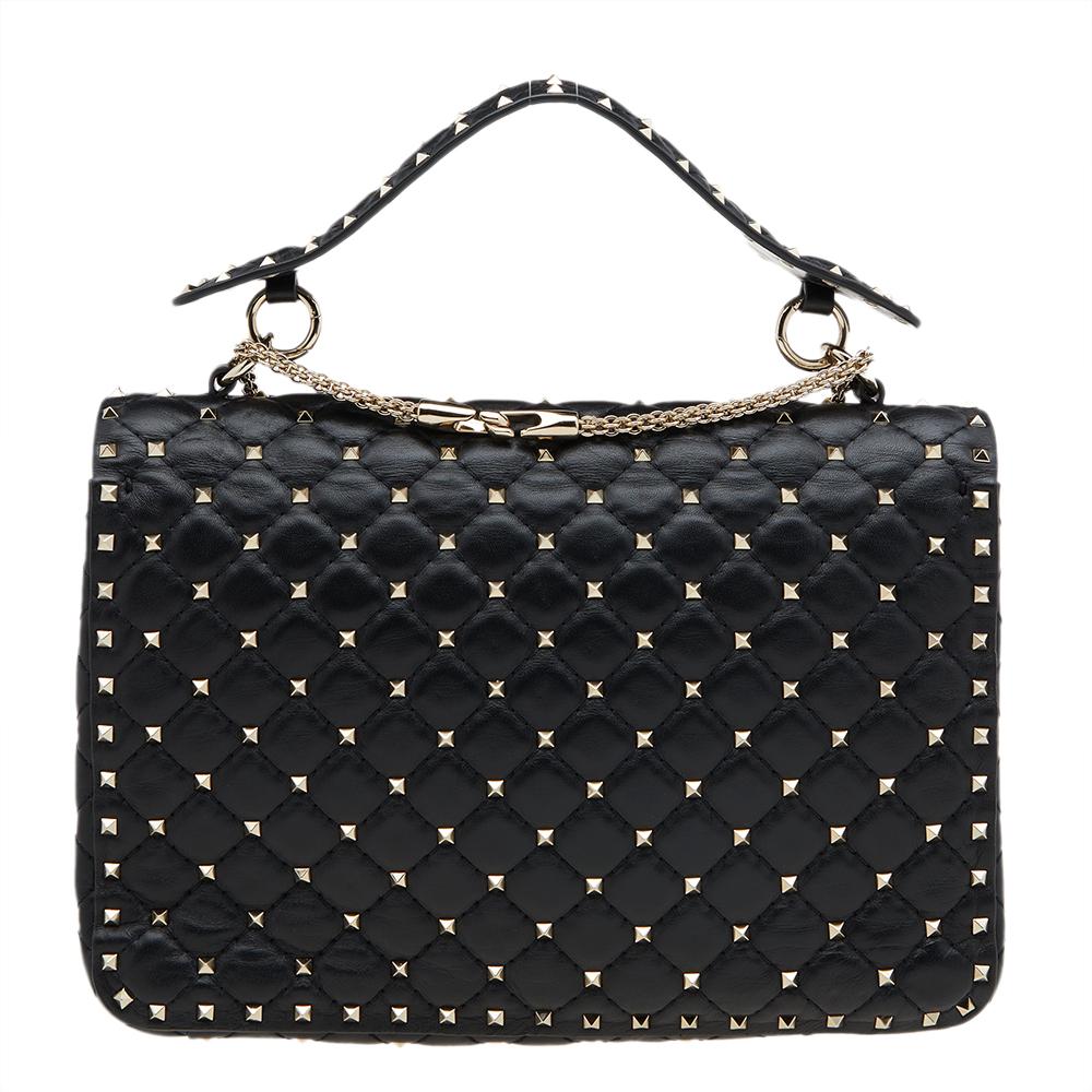 Featuring a petite silhouette enhanced with signature Rockstud embellishments, this bag from the House of Valentino will grant you iconic beauty and luxury! It is designed using black quilted leather, with a gold-tone lock closure on the front. It