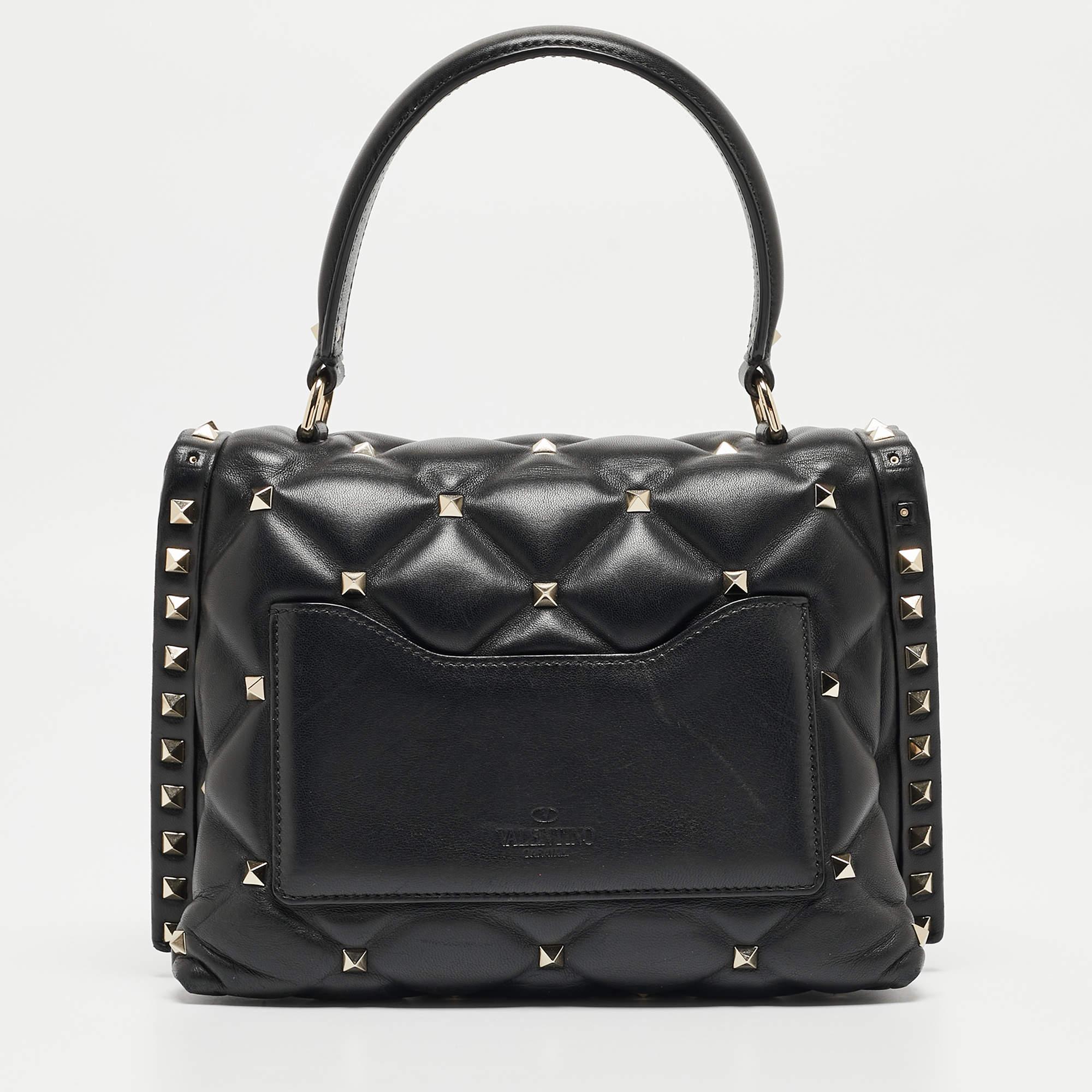 Ensure your day's essentials are in order and your outfit is complete with this Valentino bag. Crafted using the best materials, the bag carries the maison's signature of artful craftsmanship and enduring appeal.

Includes: Detachable Strap, Extra