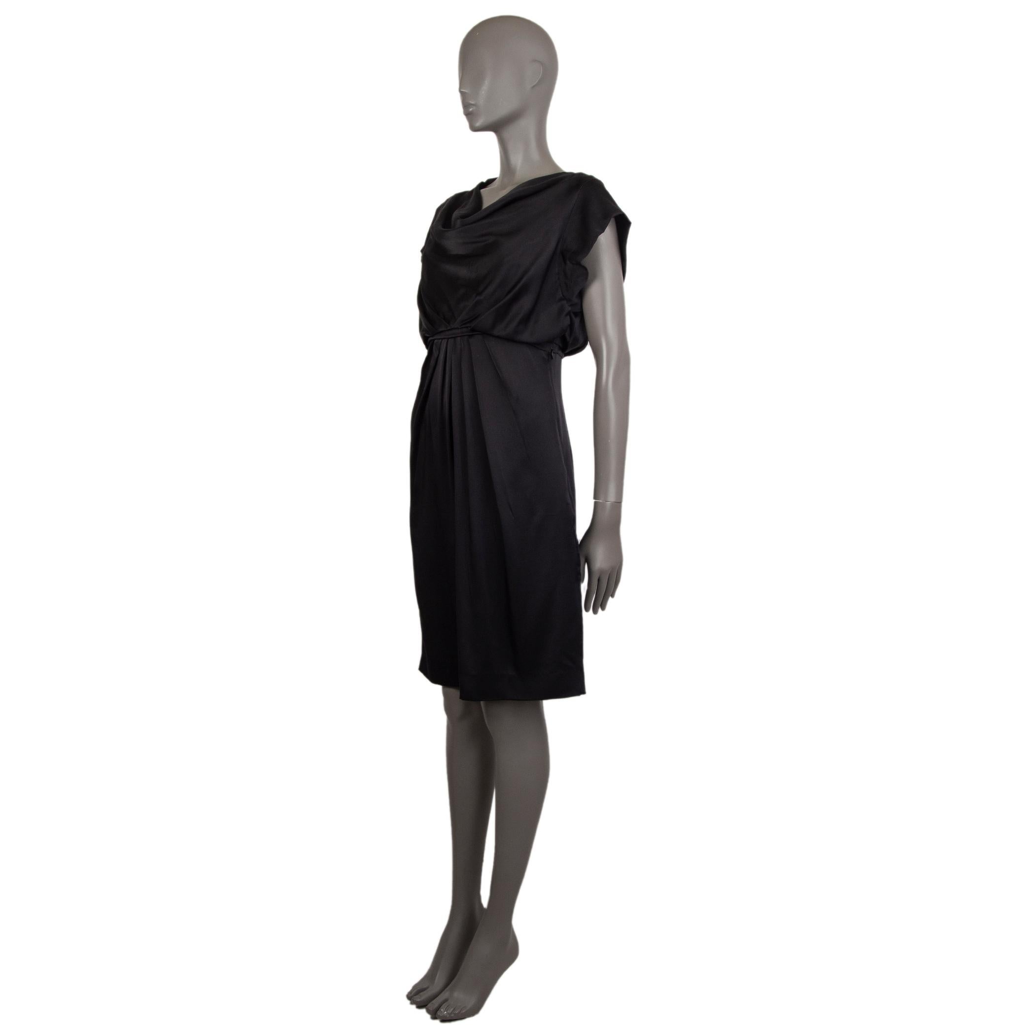 Valentino cap-sleeve satin dress in black nylon (61%) and silk (39%).With cowl neck, pleated waist, and two slit pockets on the sides. Closes with invisible zipper on the side. Unlined. Has been worn and is in excellent condition. 

Tag Size 44
Size