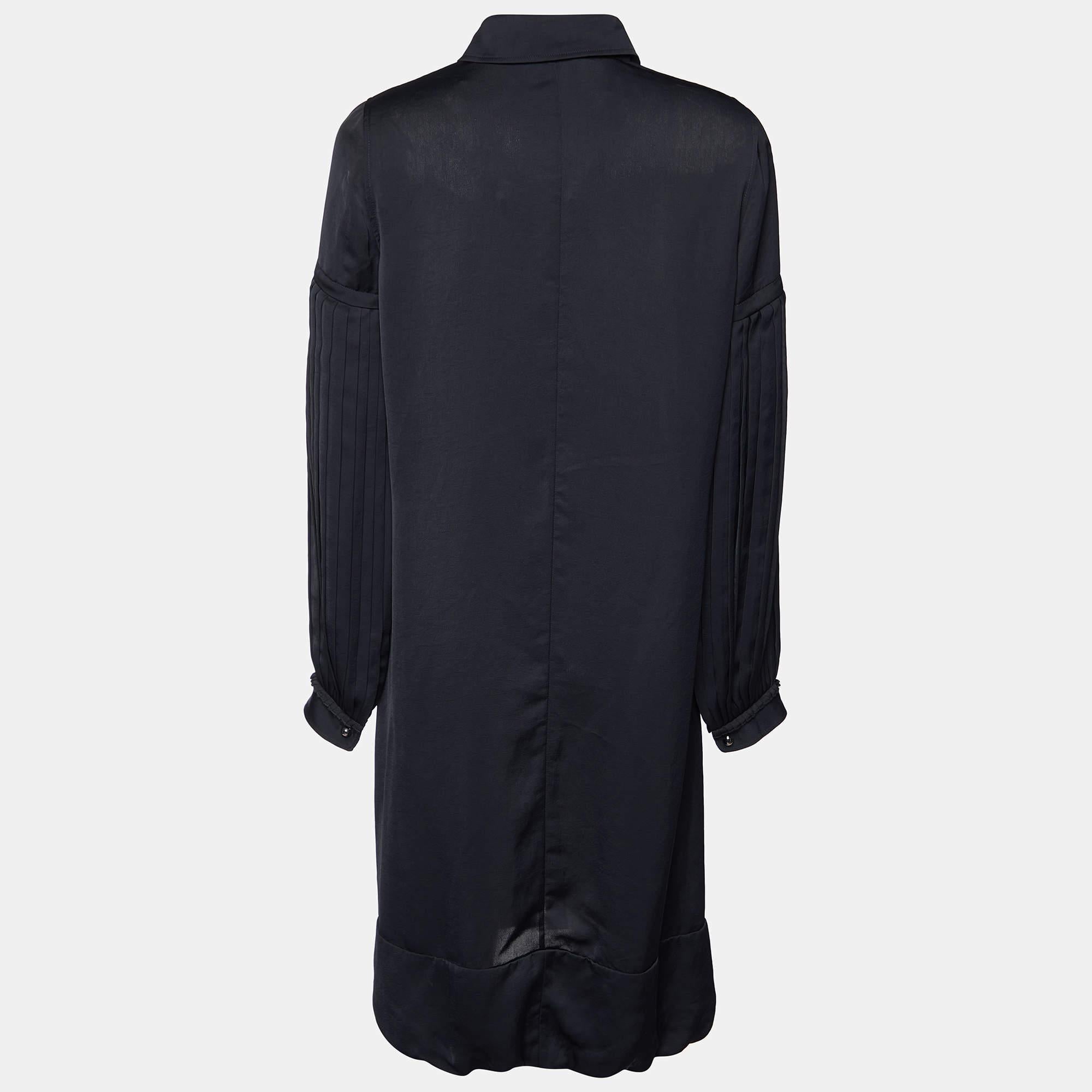 Zeigen Sie einen stilvollen Look, indem Sie dieses schöne Designerkleid tragen. Dieses aus feinem Stoff geschneiderte Kleid hat eine schicke Silhouette, die den Körper umspielt. Stylen Sie die Kreation mit schicken Accessoires und Pumps.