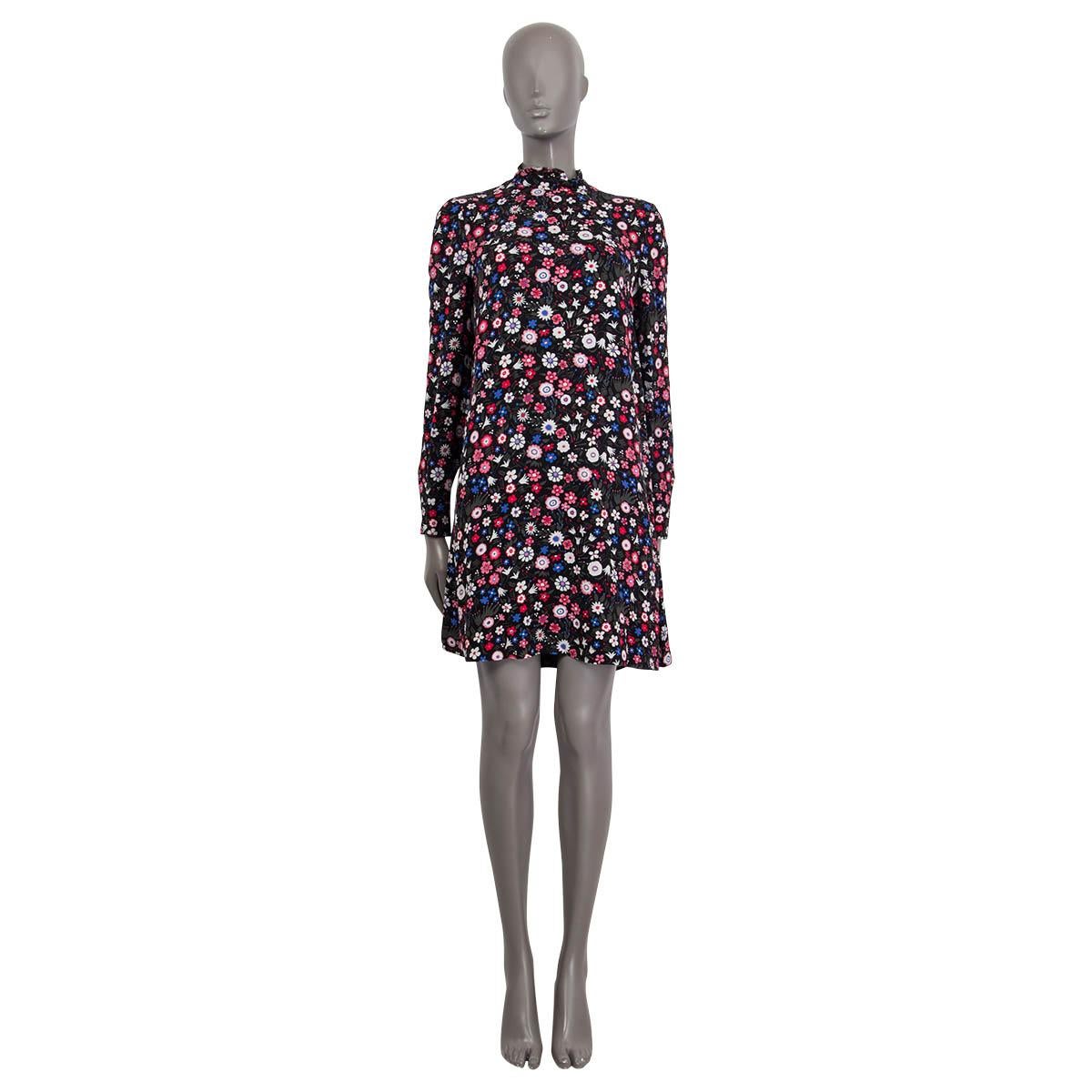 100% authentic Valentino long sleeve dress in black, purple, red, pink, white and green silk (100%). Features a ruched mock neck and buttoned cuffs. Opens with a concealed zipper and a hook at the back. Lined in black silk (91%) and elastane (9%).