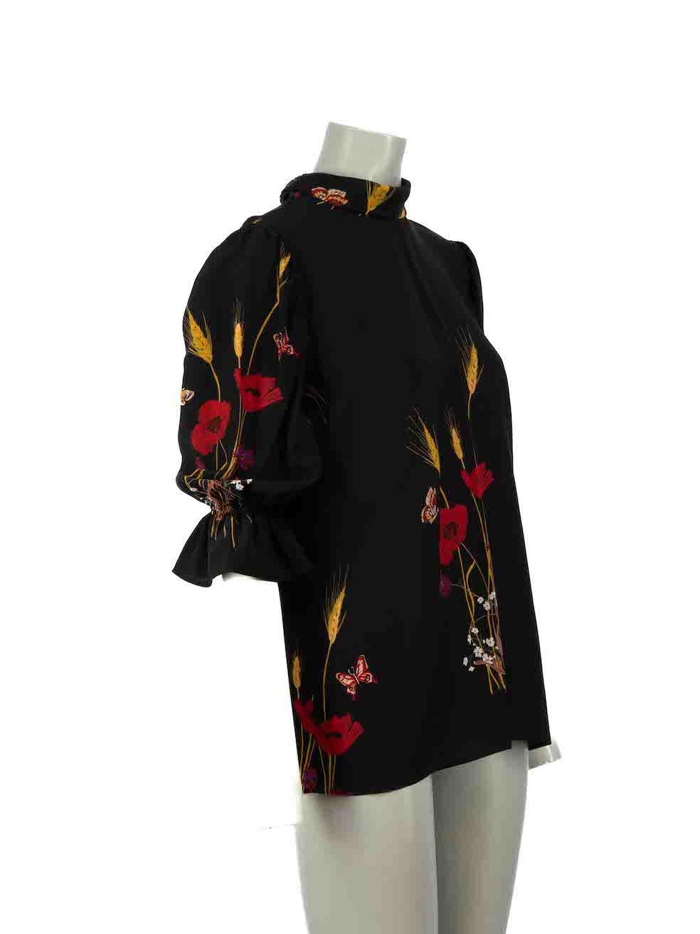 CONDITION is Very good. Minimal wear to top is evident. Minimal wear to the brand label at lining where one side has become detached on this used Valentino designer resale item.
 
Details
Black
Silk
Blouse
Floral pattern
Long sleeves
Tie neck
3/4