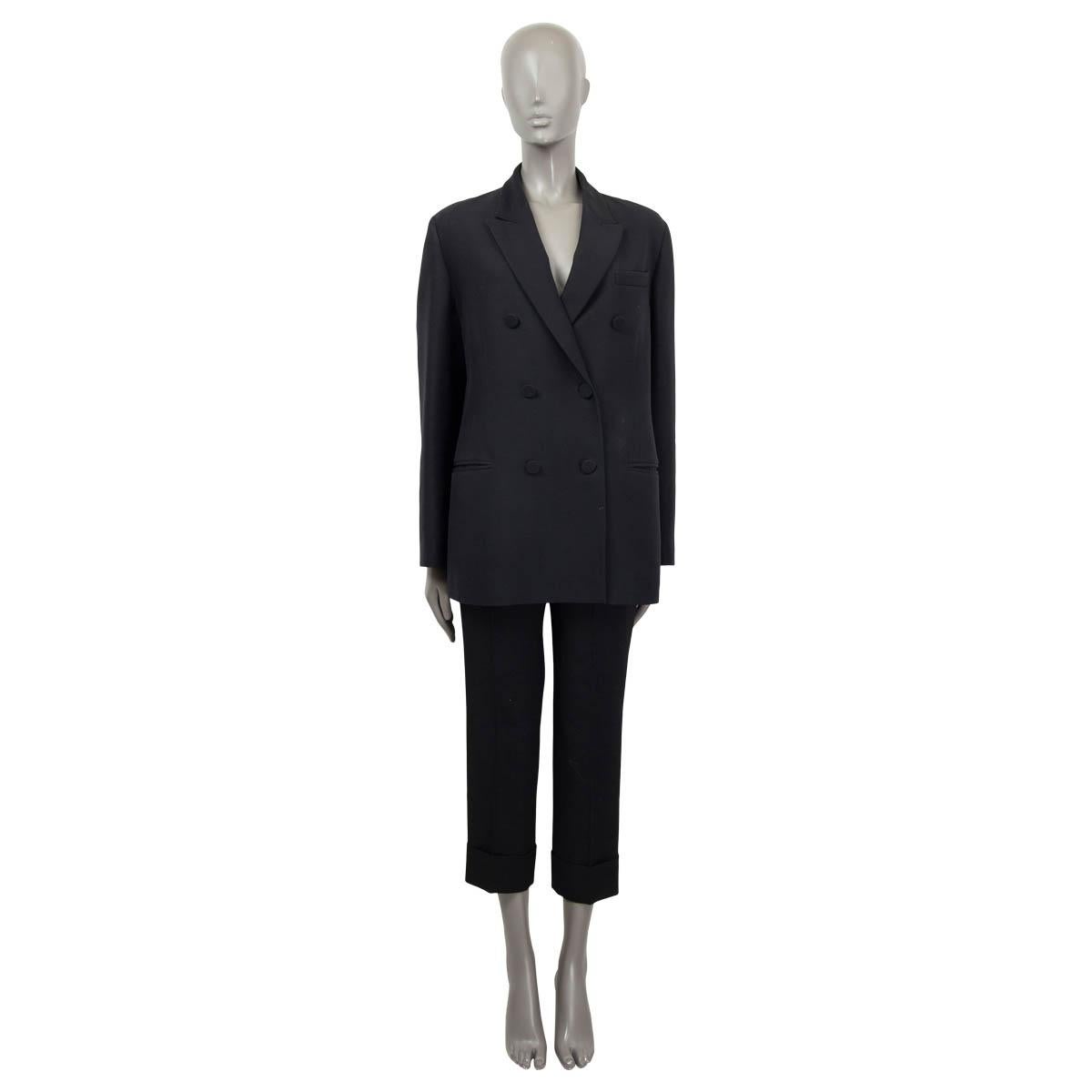 100% authentic Valentino oversized double-breasted crepe blazer in black silk (64%) and wool (36%). Features a tailored silhouette, a peak lapel, a chest pocket and two welt pockets on the front. Closes with fabric covered buttons and is lined in