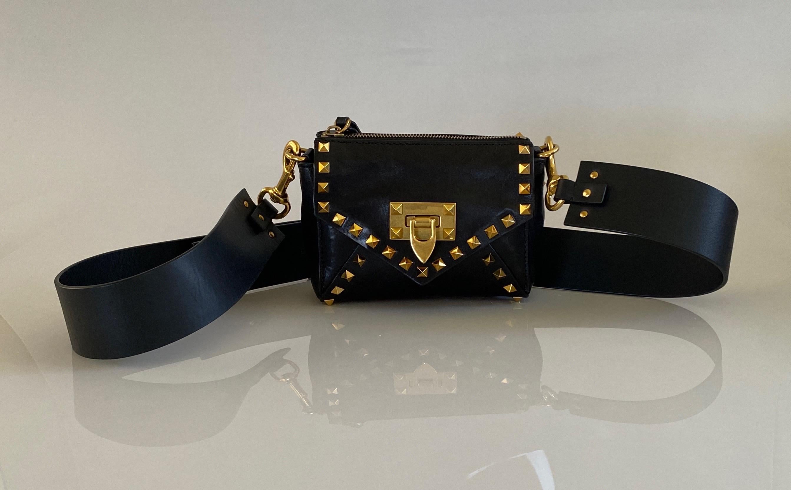 Valentino Black Small Rock Stud Caf Leather Crossbody Bag with Wide Strap - This Valentino crossbody is a perfect size for a night out or for the city/travel. Large Phone fits perfectly inside. The bag is made of a beautiful Calf leather with a