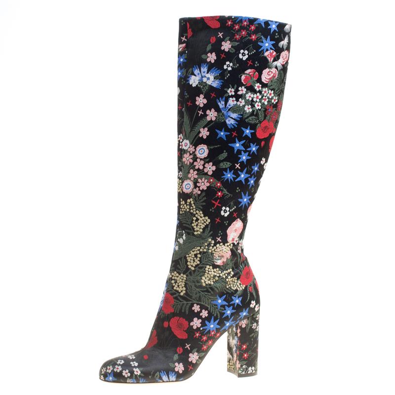 What's not to love about boots made of quality materials! Take a look at this lovely pair of Valentino boots that speak style with its silhouette and popping design. They've been crafted from brocade fabric in floral prints and detailed with side