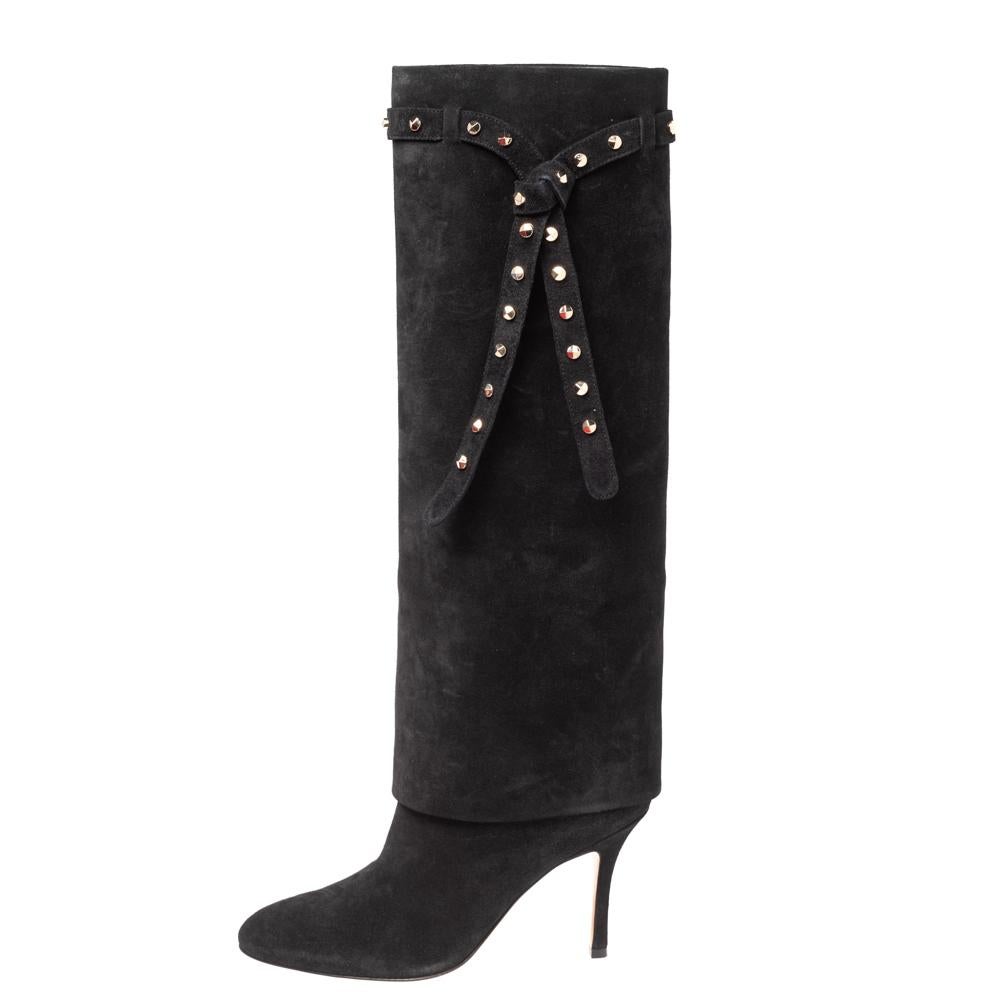 A splendid pair of suede boots keep your feet snug and comfy. This pair of knee-length boots from Valentino is truly amazing. This pair is created using black suede with a gold-toned studded bow motif perched on its exterior. It is enhanced with