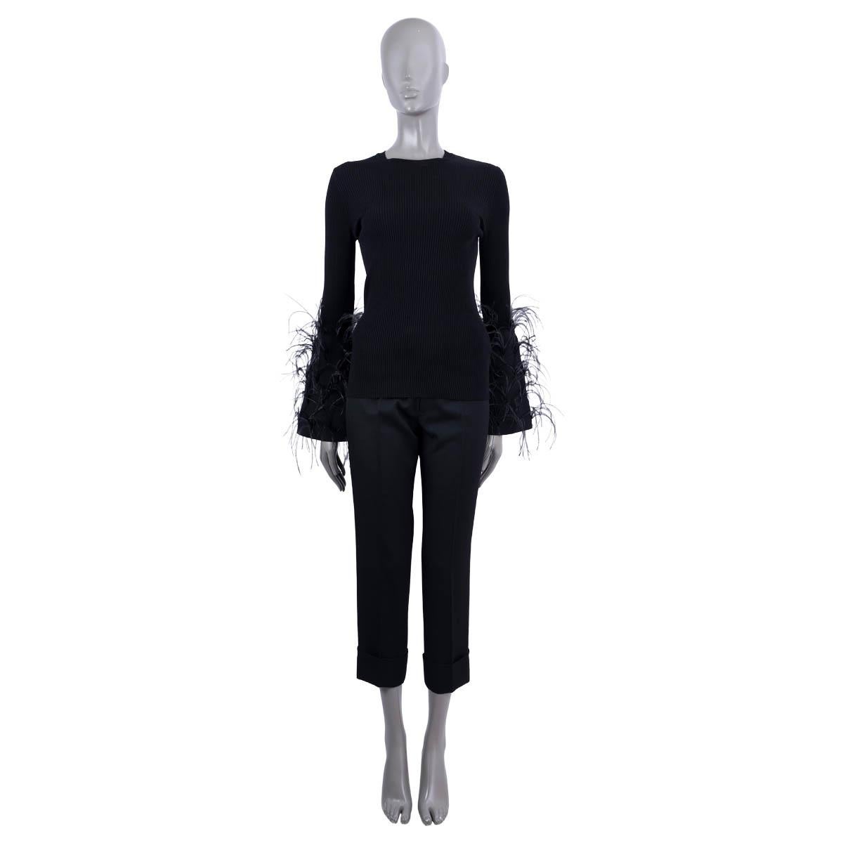 100% authentic Valentino top in black rib-knit viscose (83%) and polyester (17%). Features a feather trimmed on the sleeves. Unlined. Has been worn and is in excellent condition.

2019 Spring/Summer

Measurements
Tag Size	M
Size	M
Shoulder
