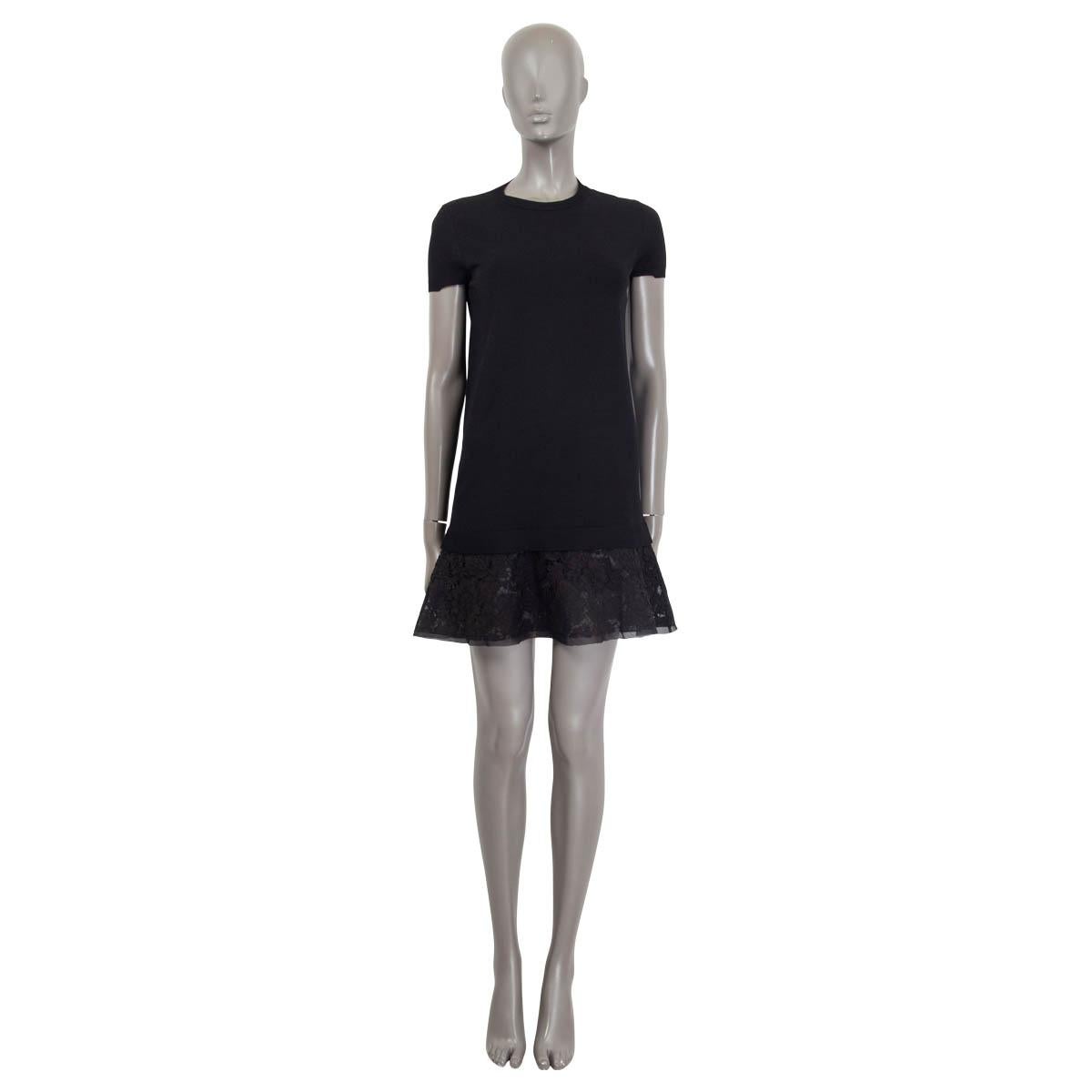 100% authentic Valentino short sleeve knit dress in black viscose (83%) and polyester (17%). Features short sleeves and a lace trim in black cotton (71%), viscose (21%) and polyamide (8%). Lace-trim lined in black silk (100%). Has been worn once and