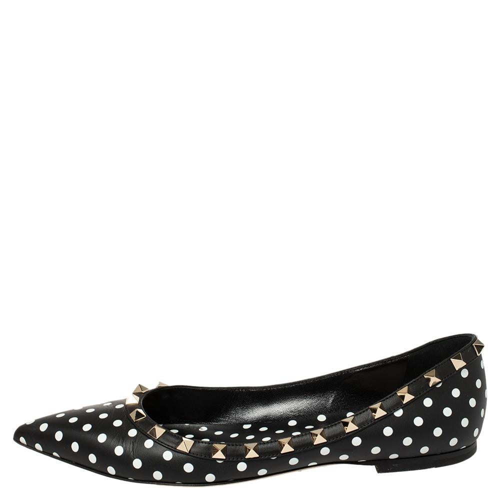 Defined by polka dots and Rockstud details on the surface, this pair of ballet flats from the house of Valentino brings a stylish appeal. These shoes have been crafted from fine-quality leather and equipped with comfortable insoles.

Includes: