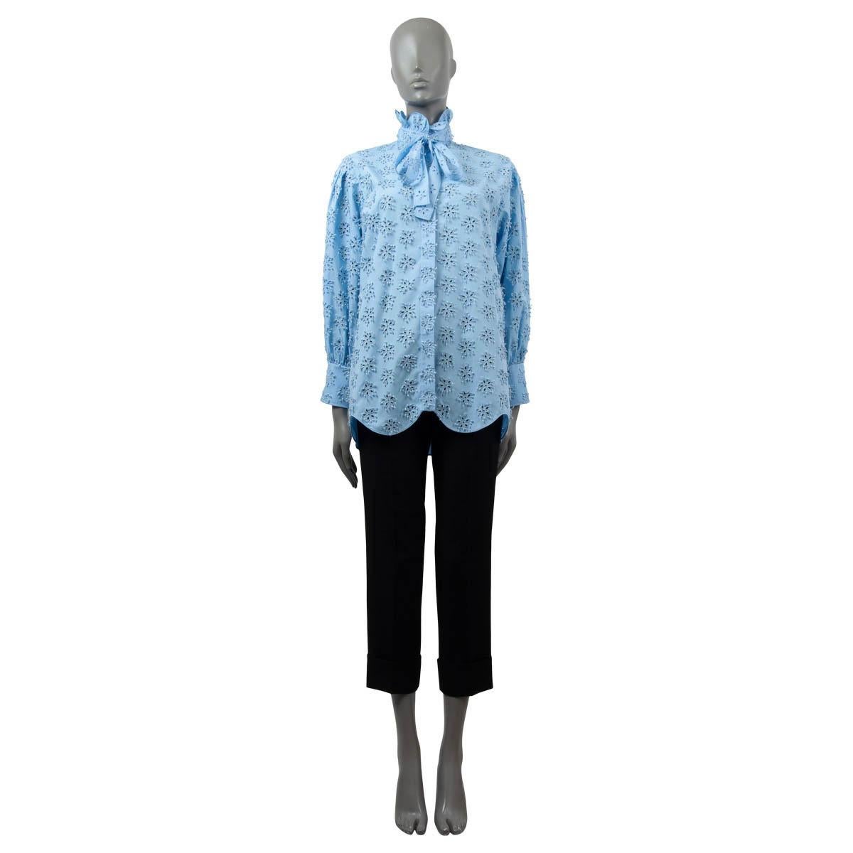 100% authentic Valentino oversized pussy-bow blouse in cornflower blue cotton (with 9% polyester). Featuring Sangallo floral embroidery on the front and sleeves and a high-neck. Relaxed fit. Closes with concealed buttons on the front. Has been worn