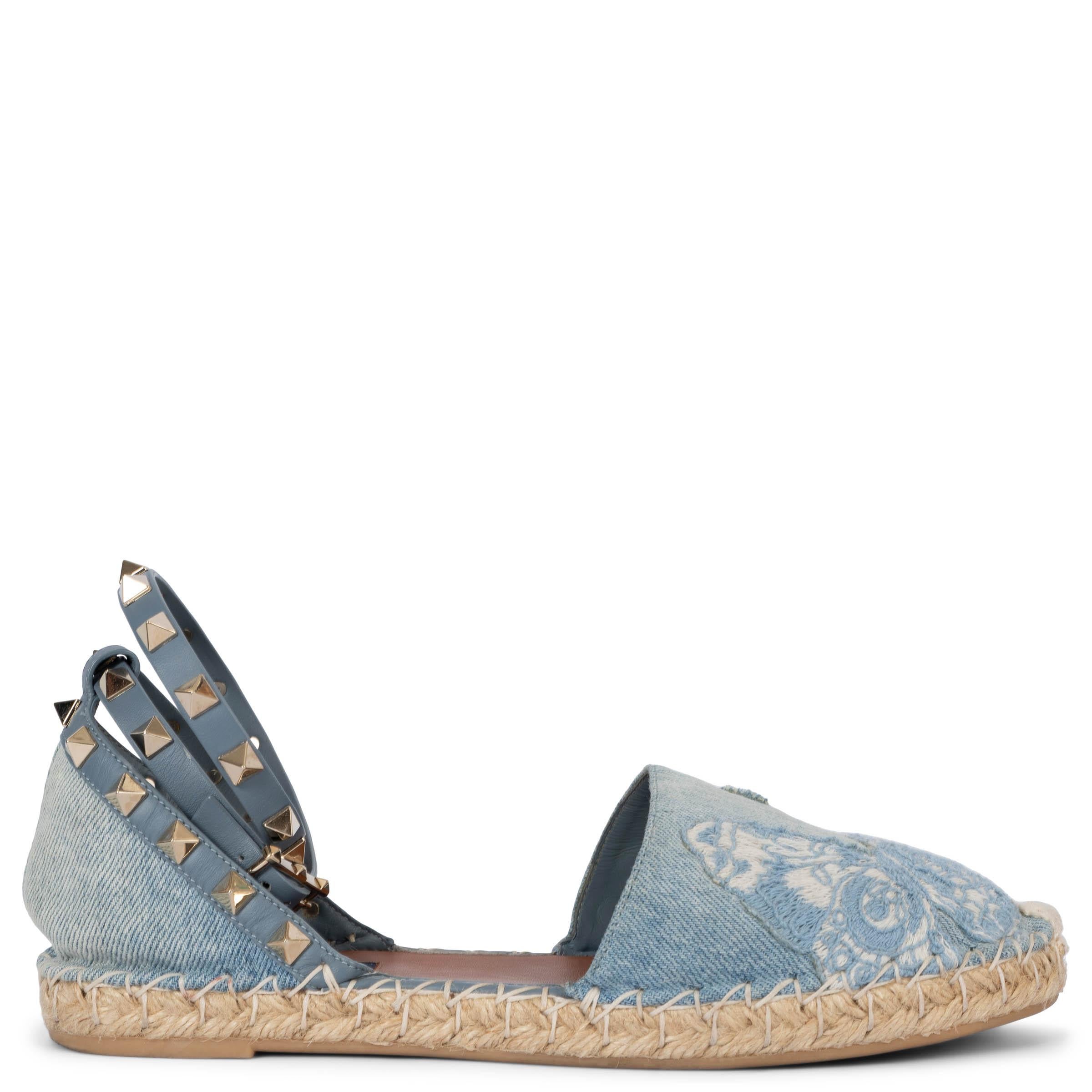 100% authentic Valentino Rockstud Camubutterfly ankle-strap espadrilles in light blue denim with blue leather trim.  The canvas is embellished with white and blue butterfly embroidery. Have been worn and are in excellent condition.