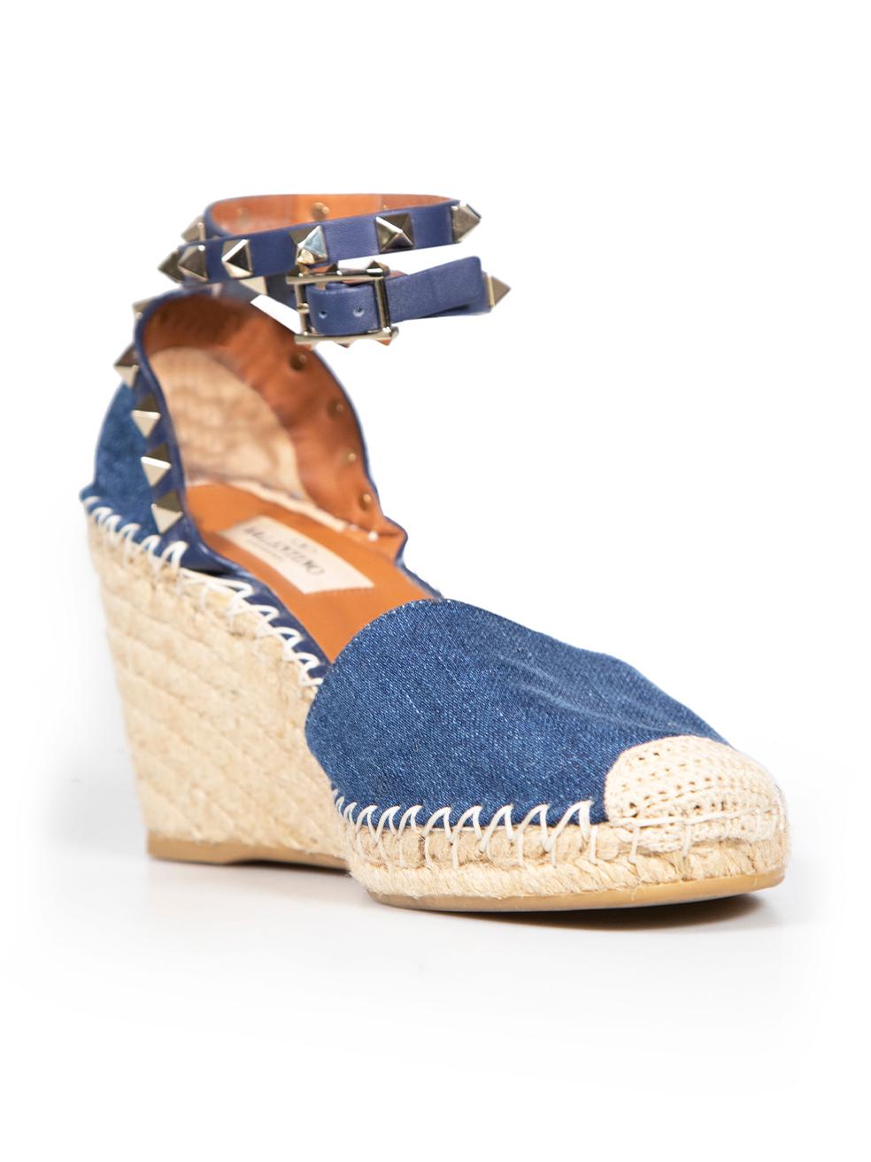 CONDITION is Very good. Minimal wear to wedges is evident. Minimal wear to soles on this used Valentino designer resale item. These shoes come with original dust bag.
 
 
 
 Details
 
 
 Blue
 
 Denim
 
 Wedge espadrilles
 
 Rockstud accent
 
 Round