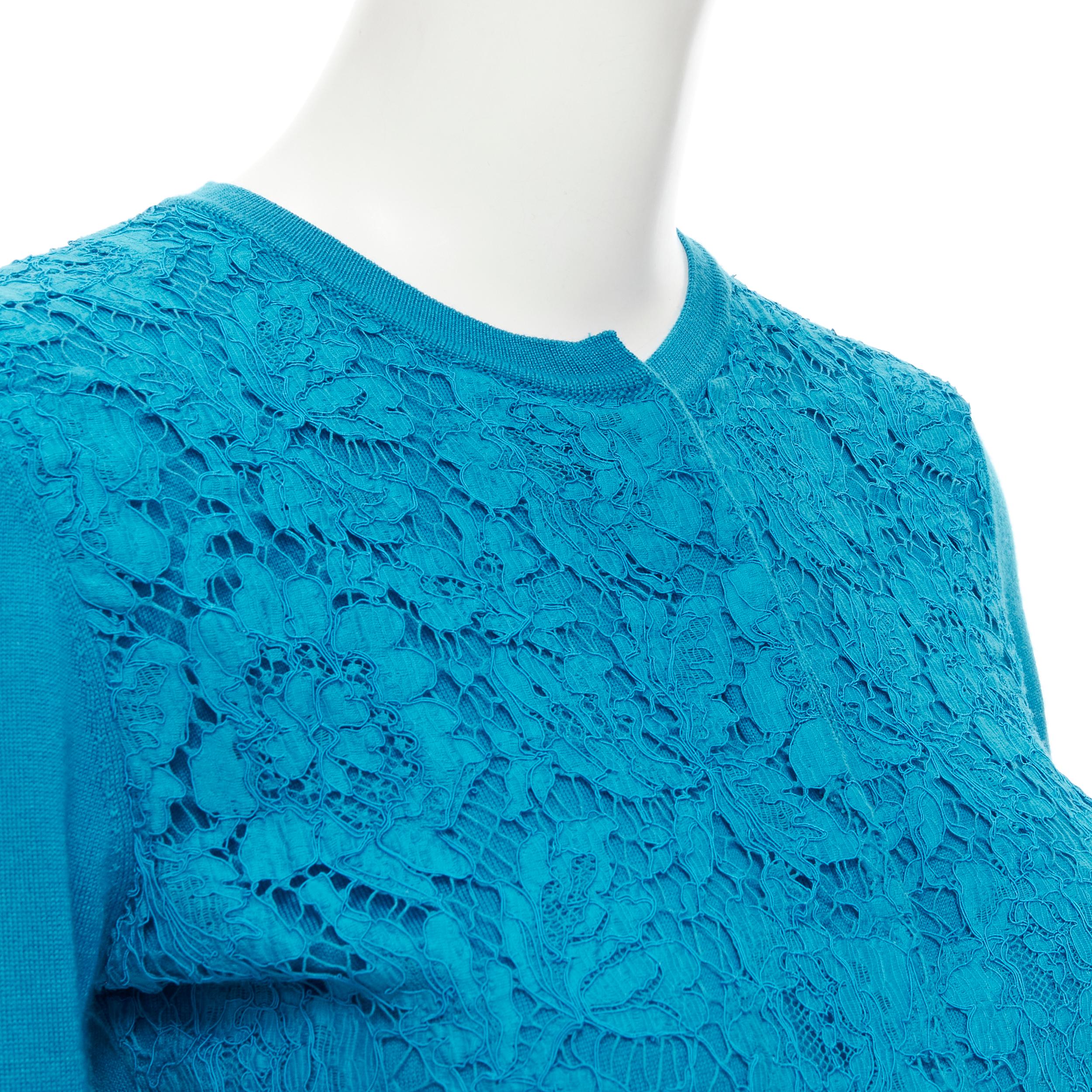 VALENTINO blue floral lace front wool silk cashmere cardigan sweater S 
Reference: LNKO/A01952 
Brand: Valentino 
Material: Wool 
Color: Blue 
Pattern: Solid 
Closure: Button 
Extra Detail: Concealed button front. 
Made in: Italy 

CONDITION: