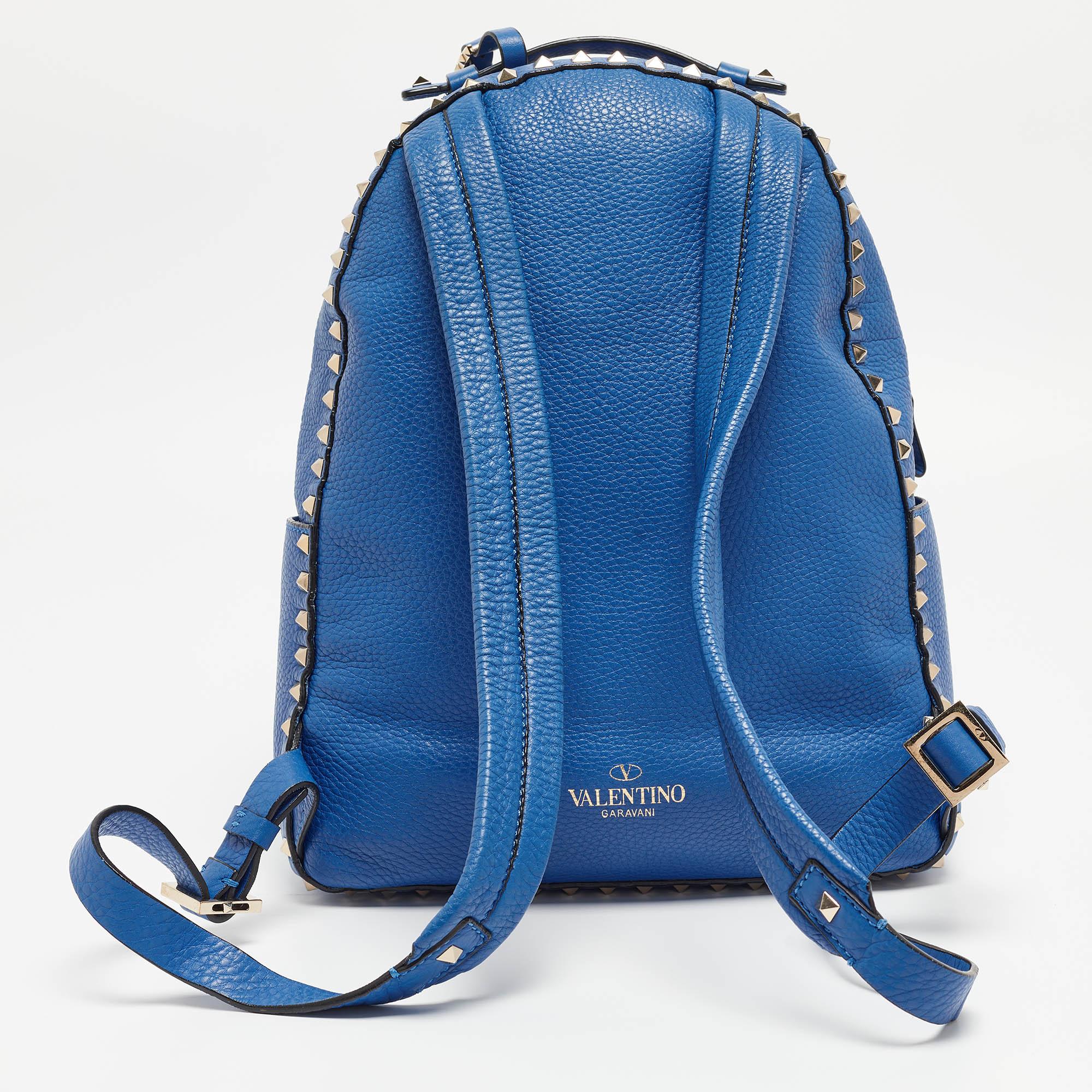 Marked by flawless craftsmanship and enduring appeal, this Valentino blue backpack is bound to be a versatile and durable accessory. It has a practical size.

