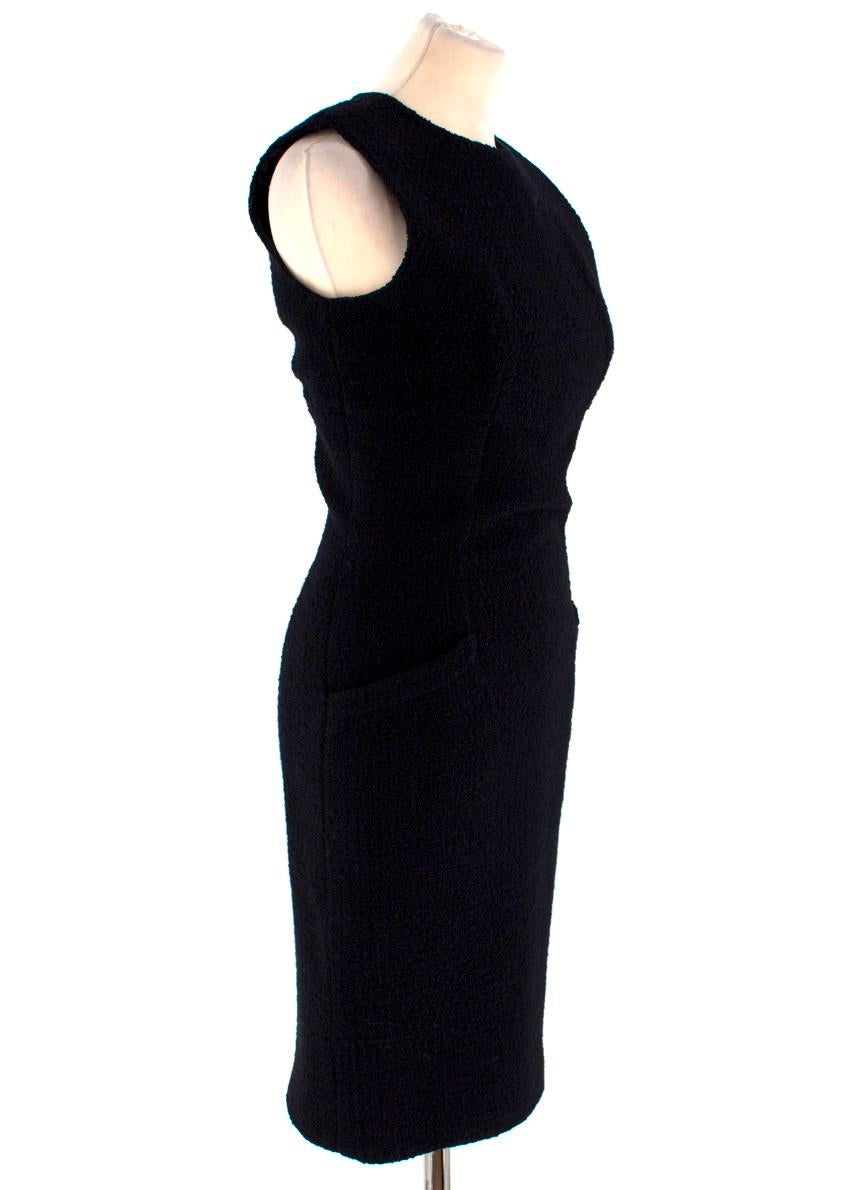 Valentino Boutique Black Fitted Dress

-Vintage black fitted dress which is tailored around the bust and waist
-Sleeveless knee length dress
-Two front pockets
-Back zip closure

Please note, these items are pre-owned and may show signs of being
